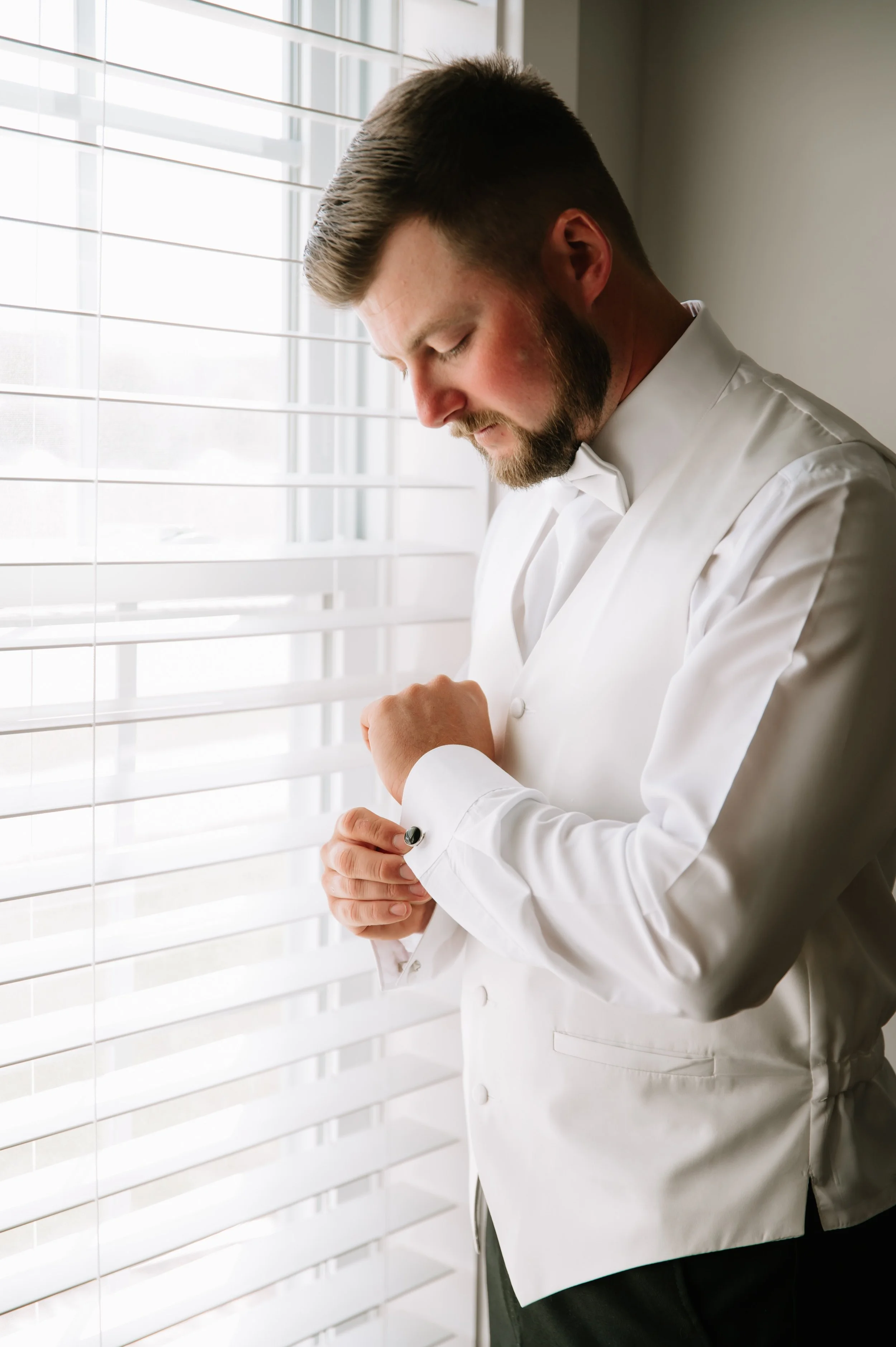 groom before ceremony.jpg