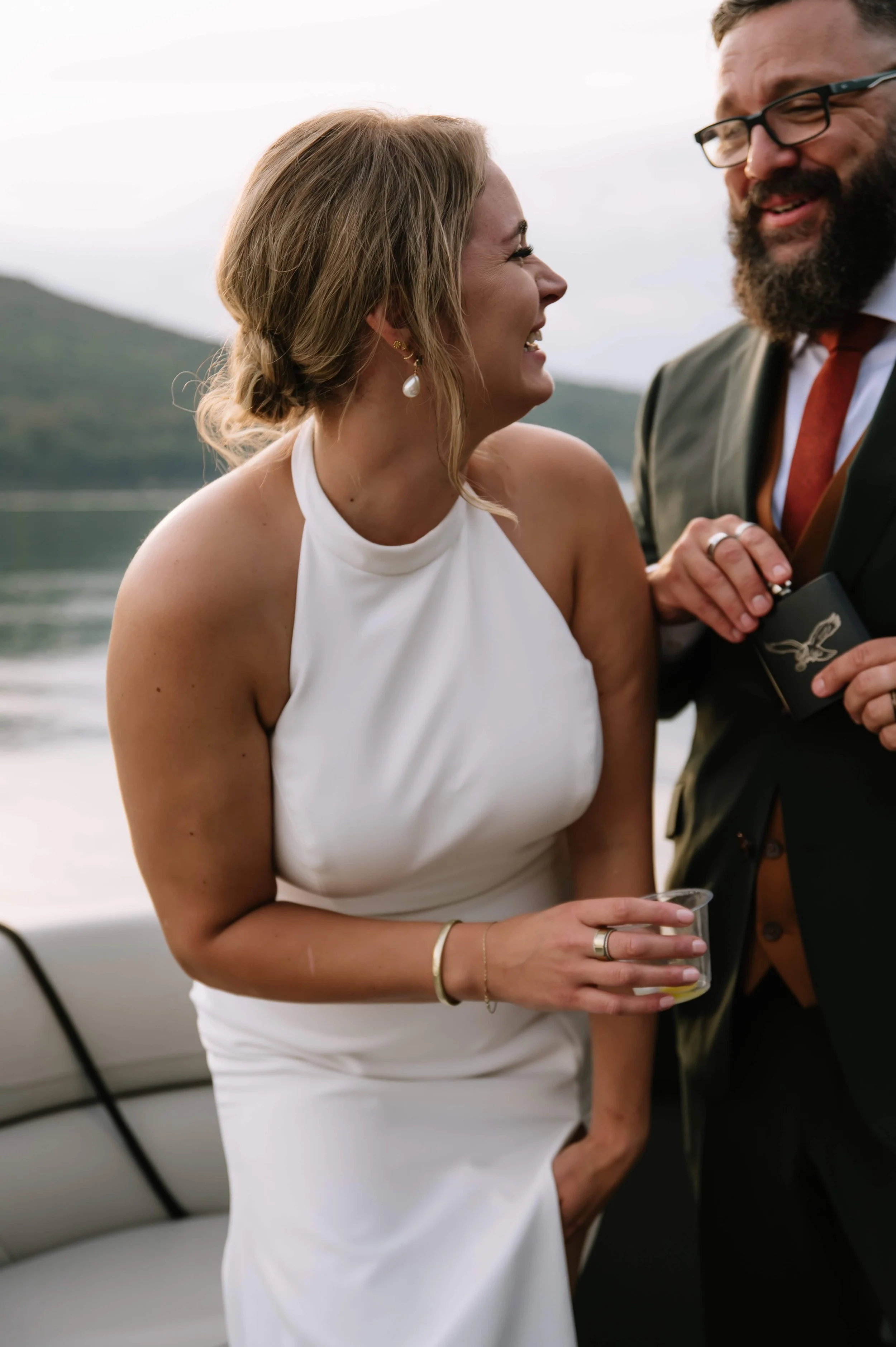 bride laughing on boat.jpg