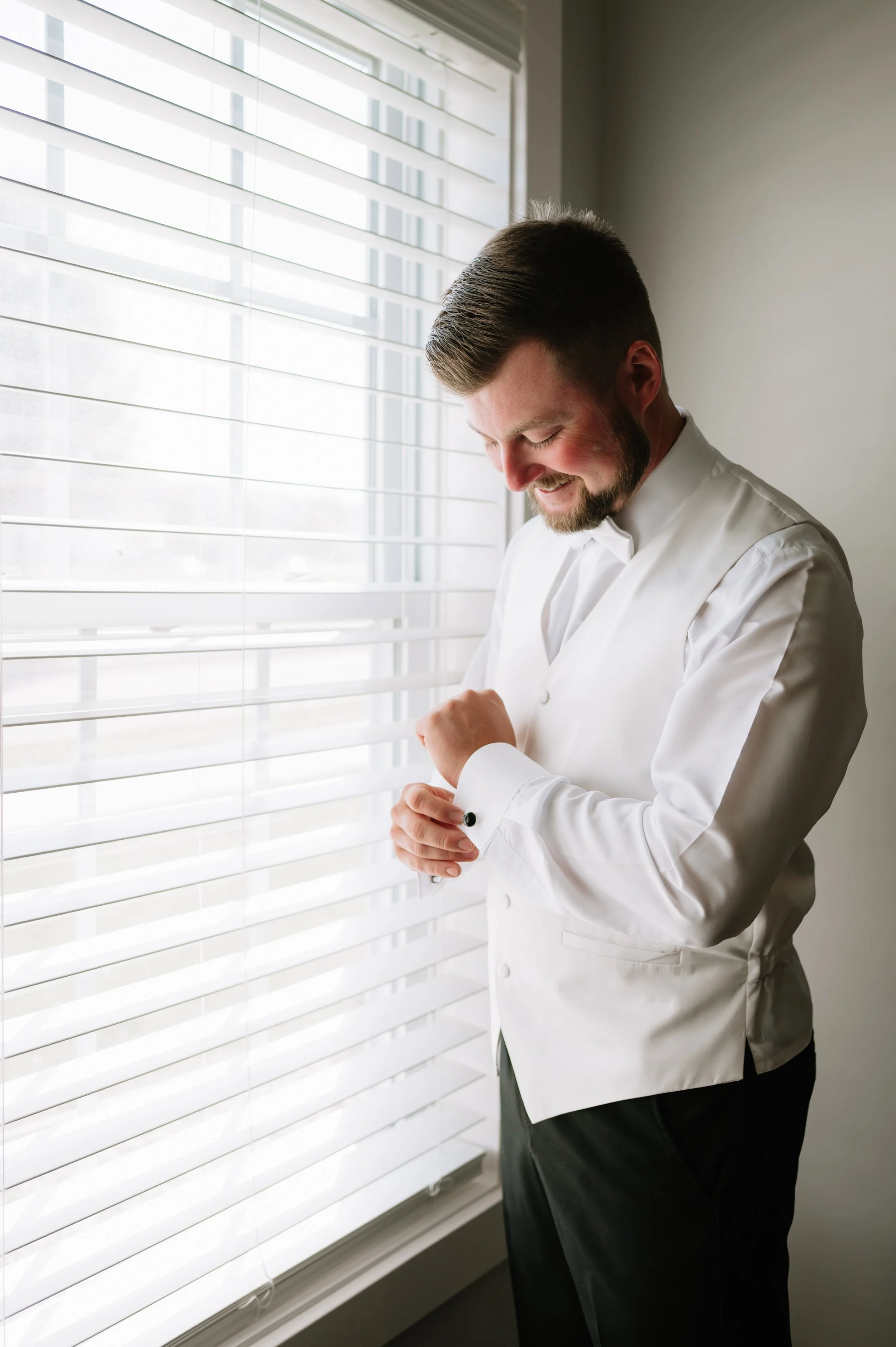 groom getting dressed.jpg