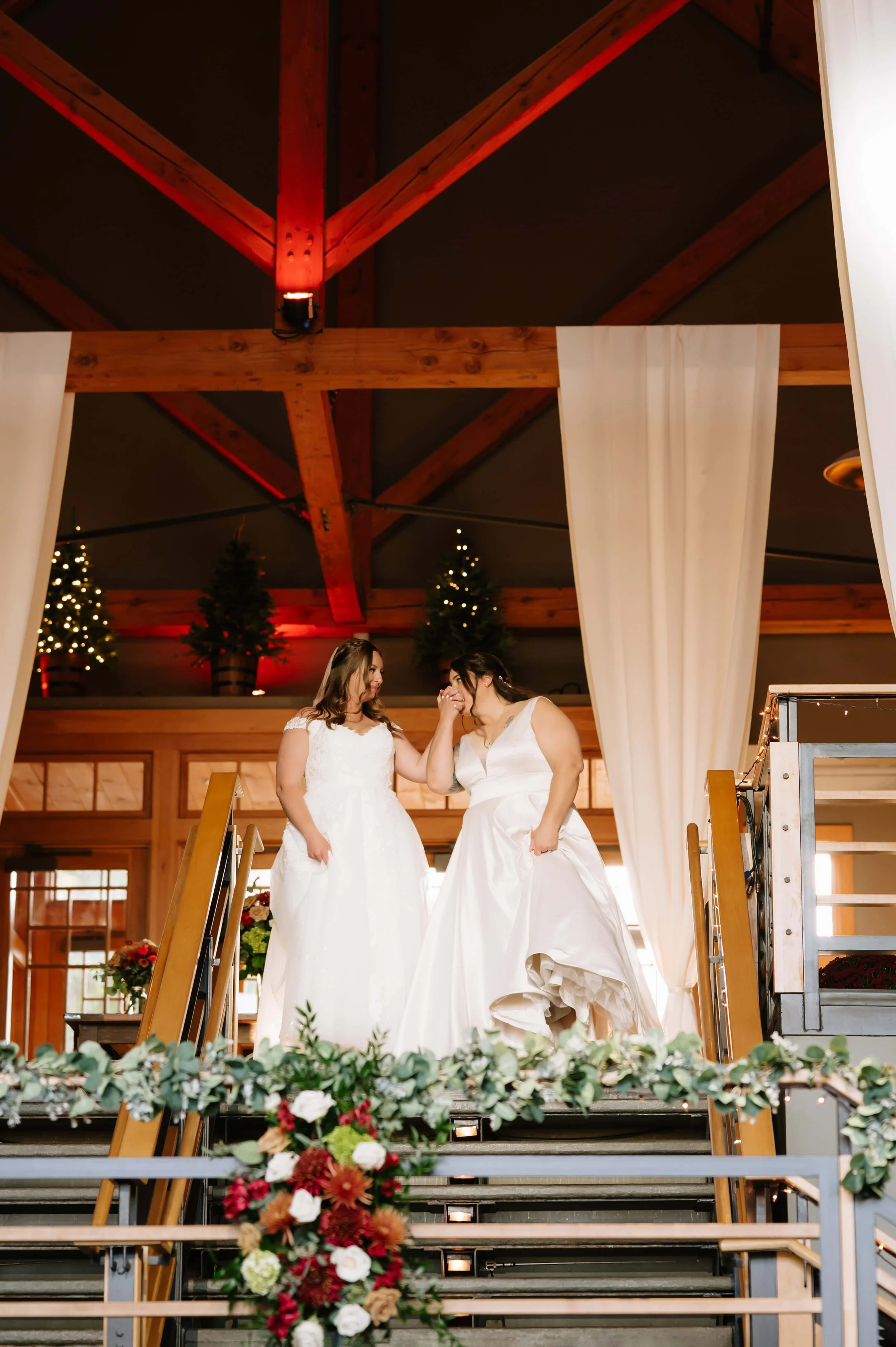 bride kissing her wife's hand.jpg
