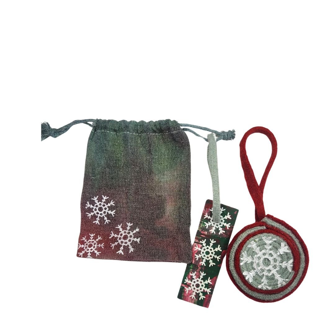 Upcycled Wool Christmas Ornament with Original Snowflake Graphic with a Red and Green Hand-Dyed Reusable Muslin Gift Sack & Tag. - Gladiator Art & Apparel