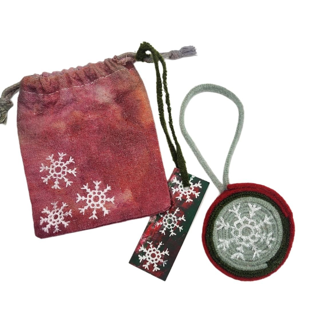 Upcycled Wool Christmas Ornament with Original Snowflake Graphic with a Red and Green Hand-Dyed Reusable Muslin Gift Sack & Tag. - Gladiator Art & Apparel