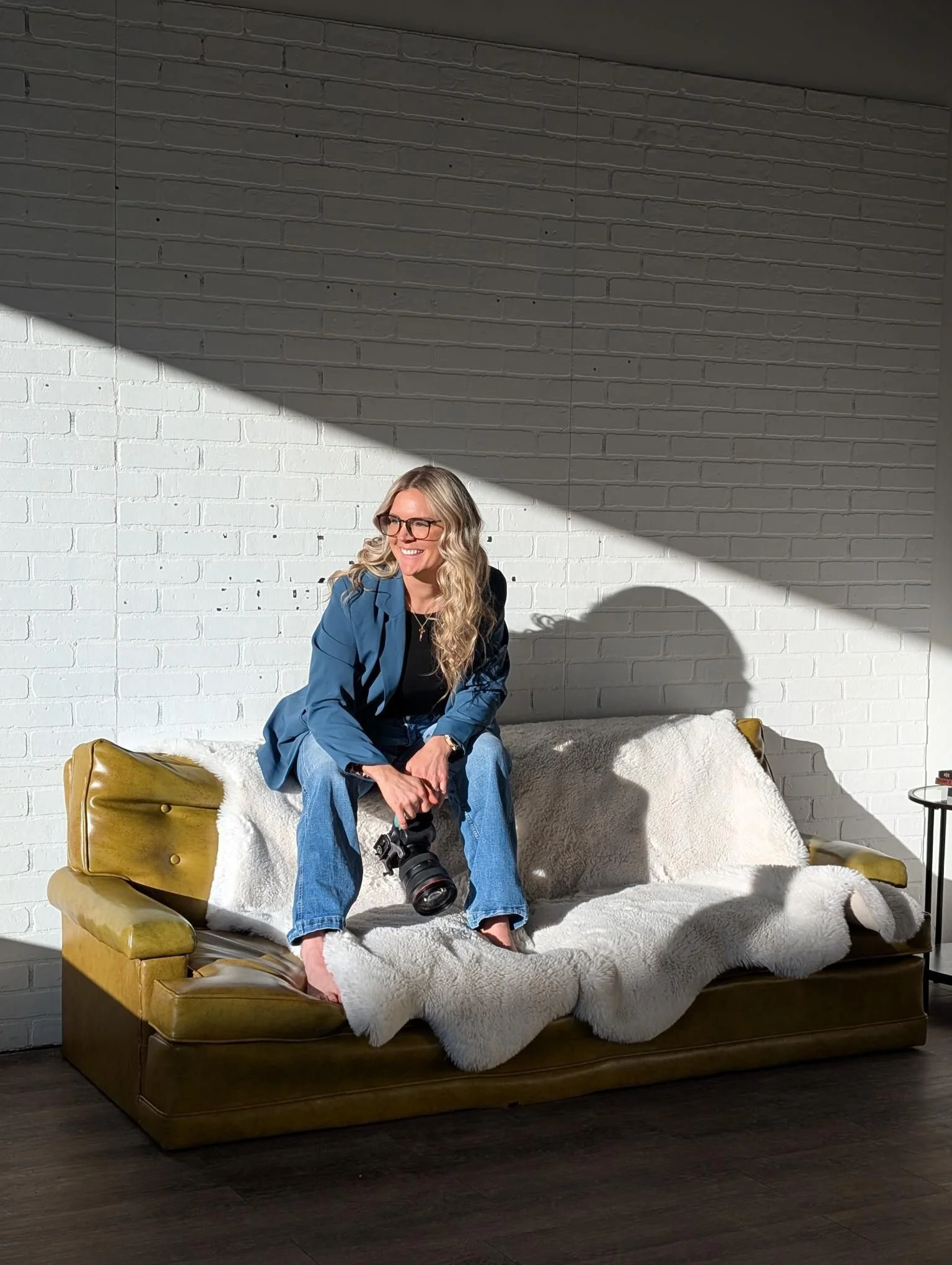 Directing a client during an in-home business photography session