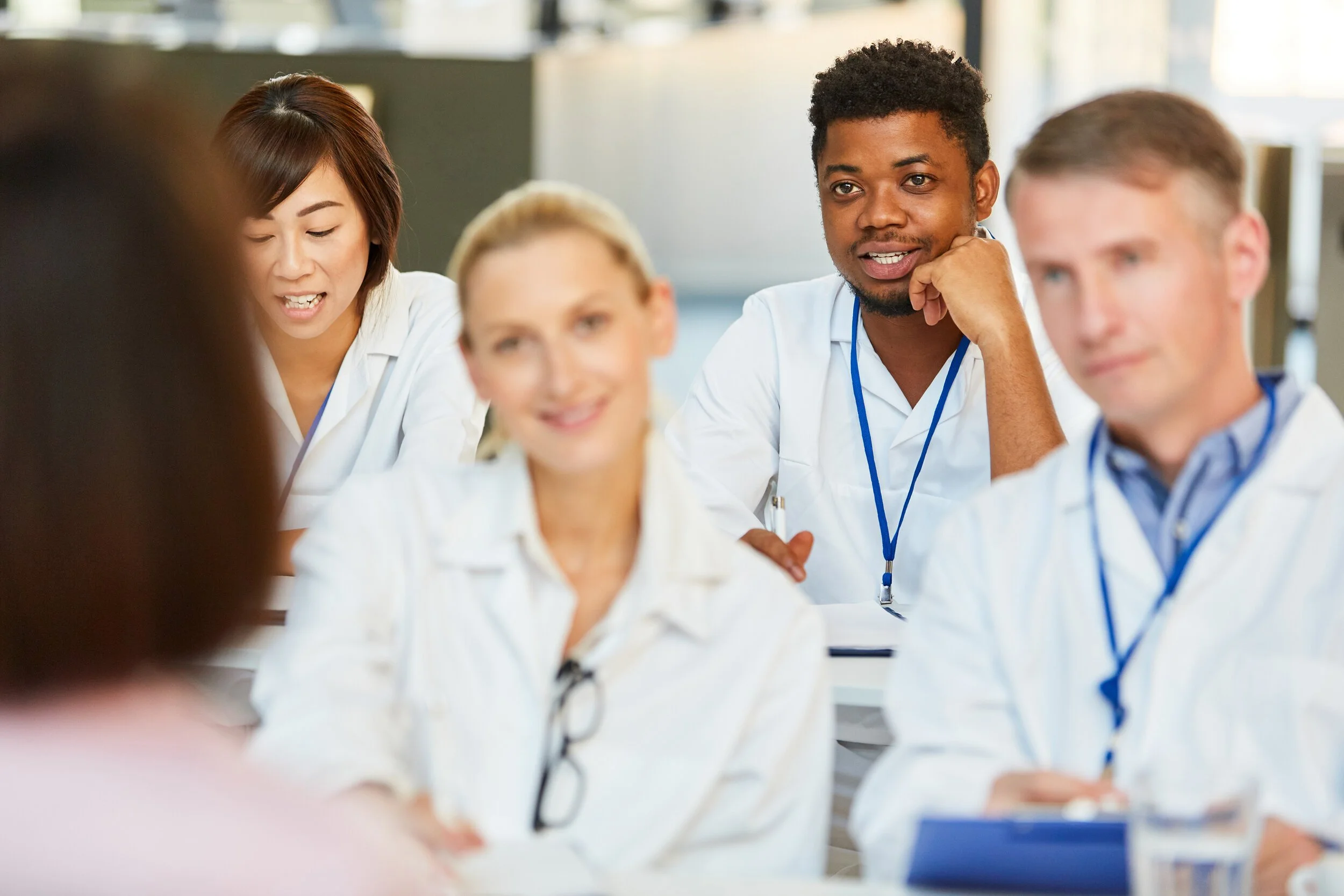 A group of medical professionals in a lecture