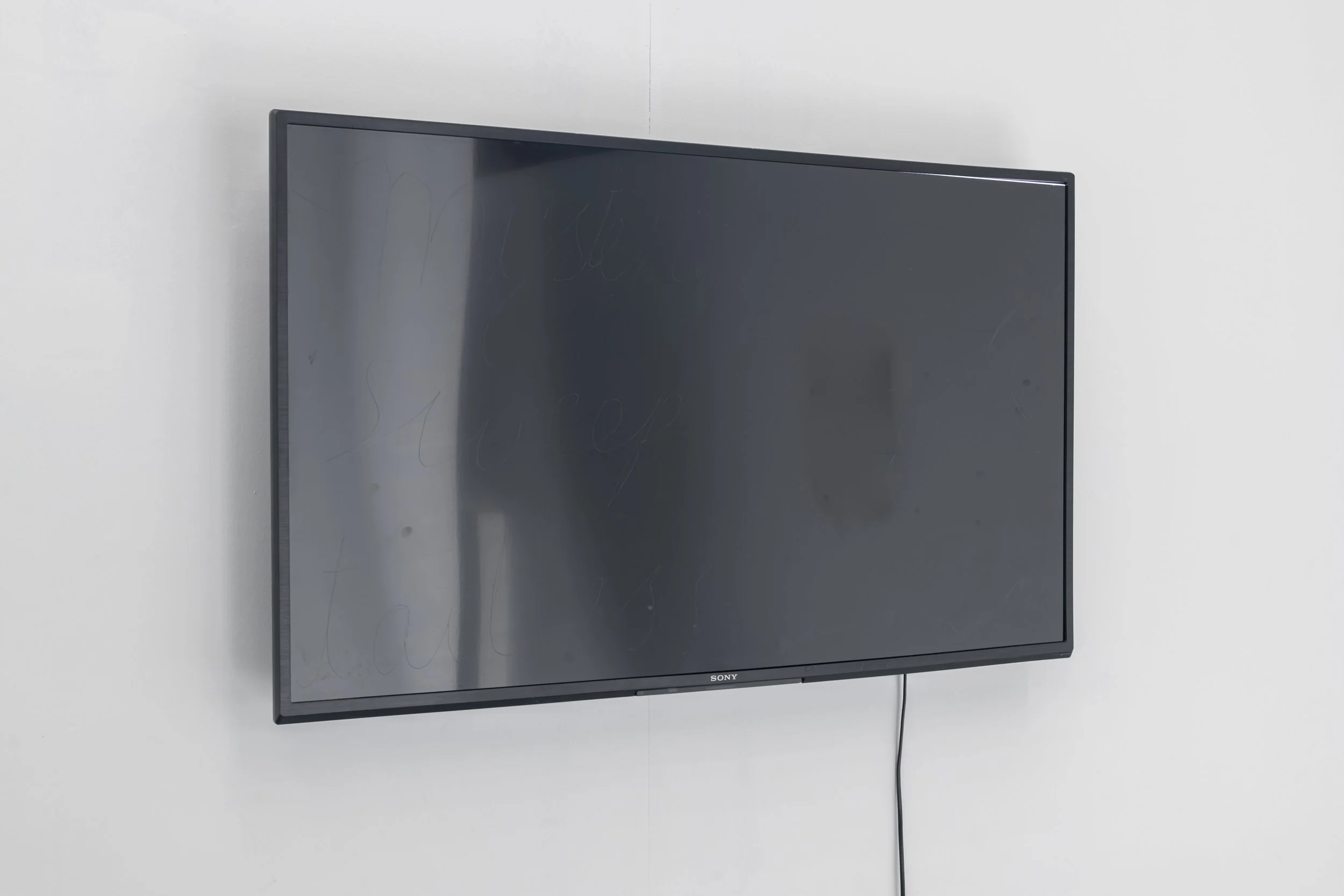 'Mysteries of sweep with a tailless horse', 2026, broken liquid crystal display, 62.2 x 110.7 x 15 cm