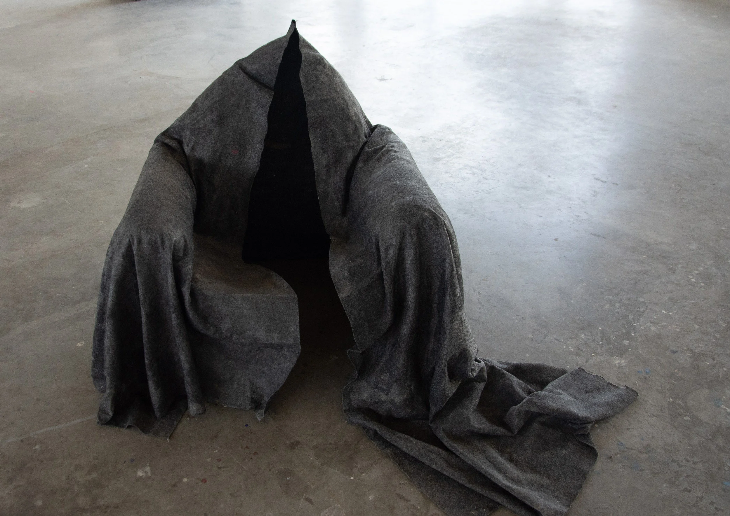 Presence of an Absence, 2023. Carpet cast of an armchair, 80 × 60 × 60 cm.