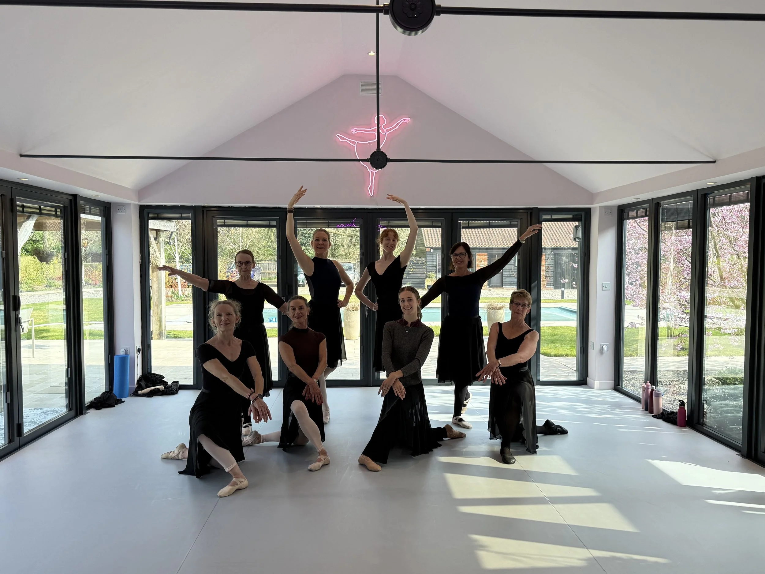 Ballet group posing in a Norfolk dance studio.