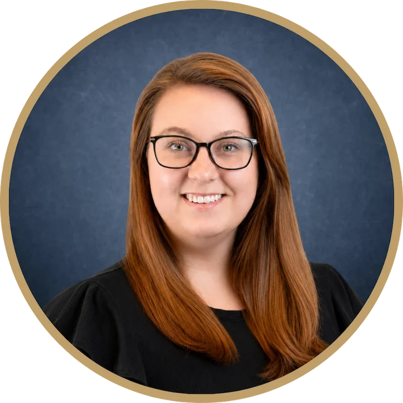 A circle headshot of Meaghan Fellinger.