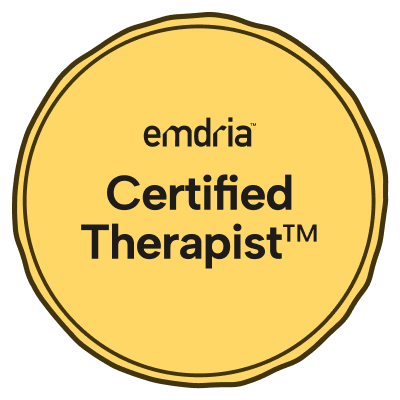 A yellow badge that says emdria Certified Therapist.