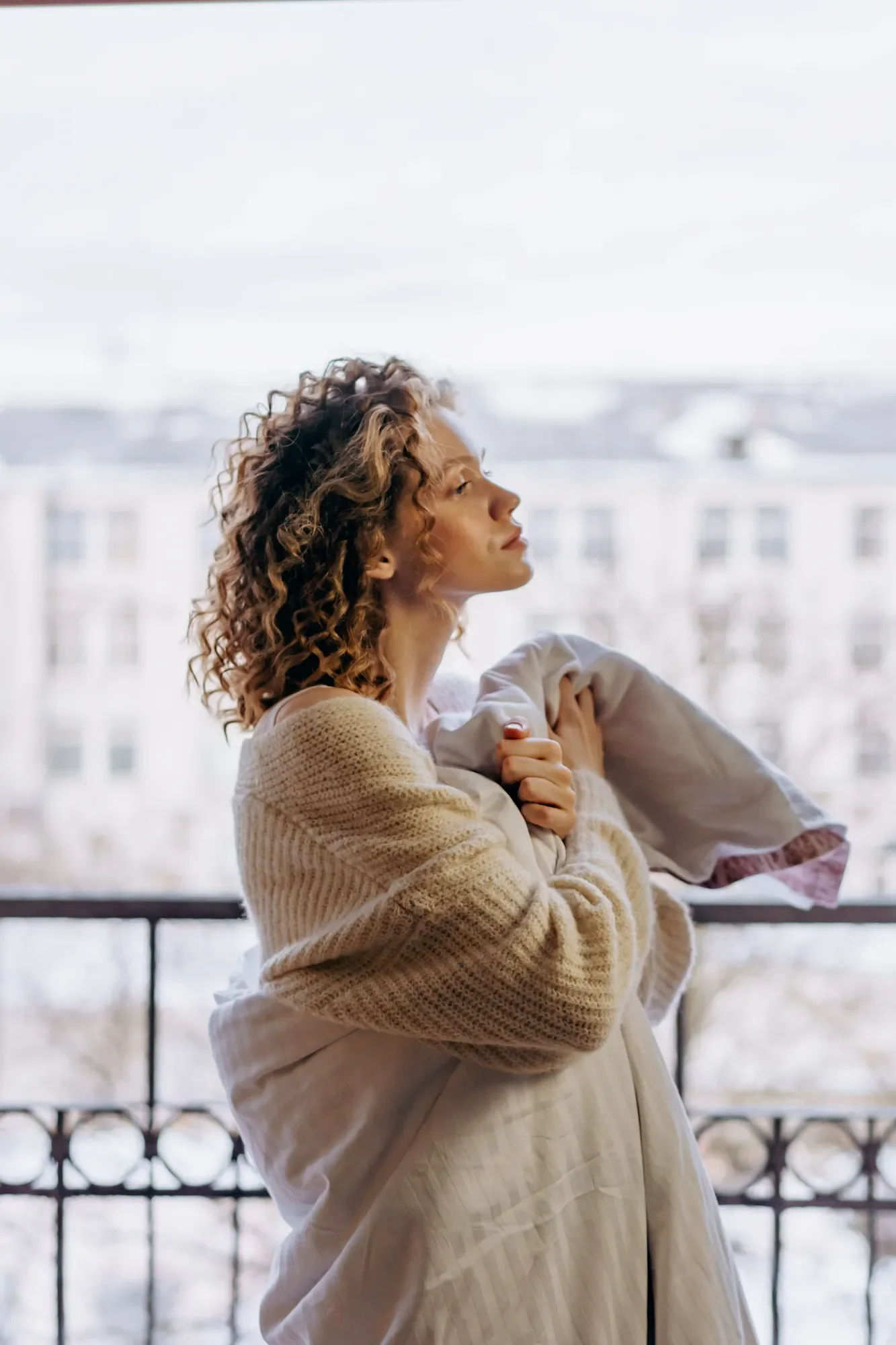 A woman in the balcony.