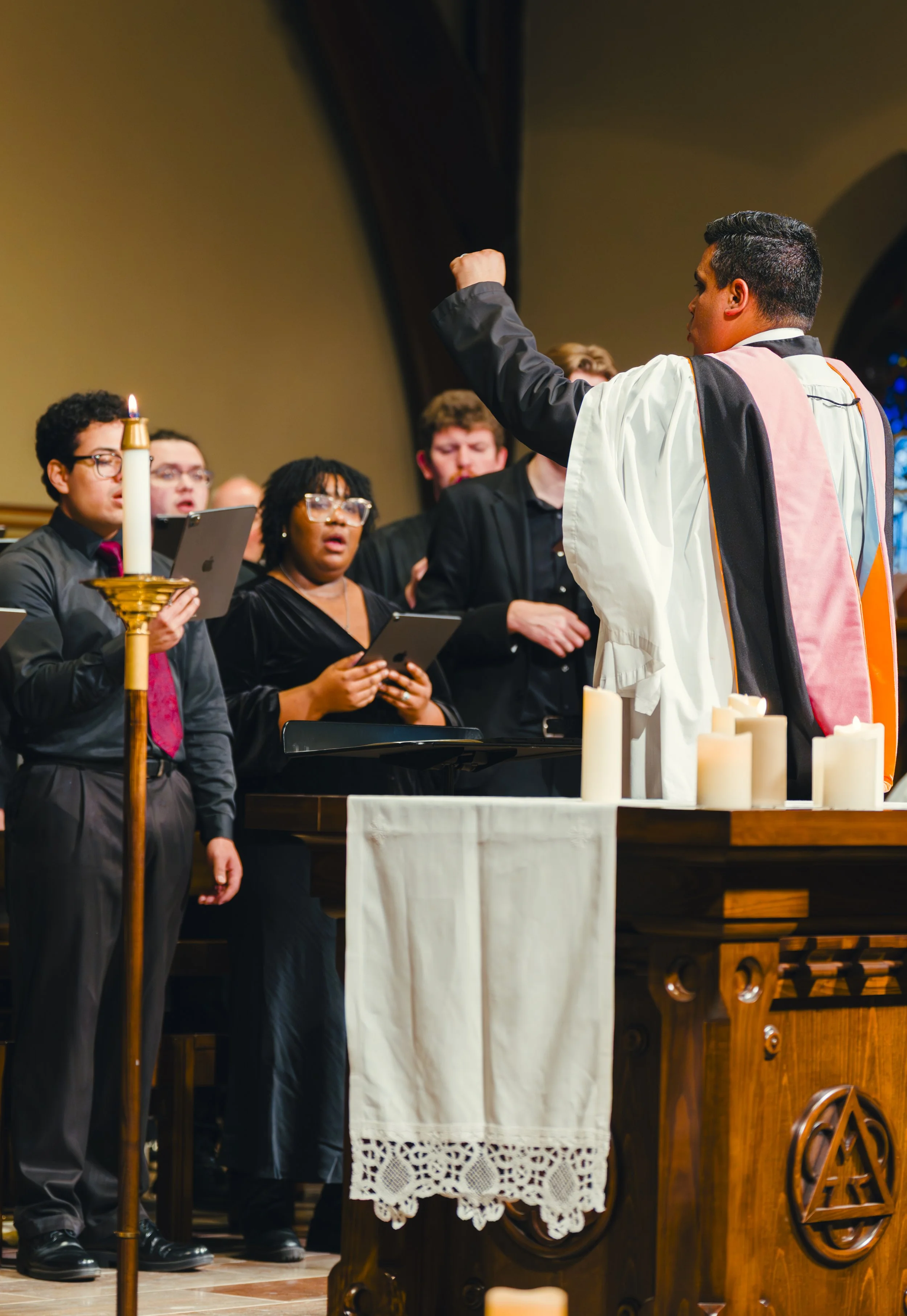 Benjamin conducts the Southern Virginia University Chamber Singers in Evensong at Grace Episcopal Church, Lexington VA