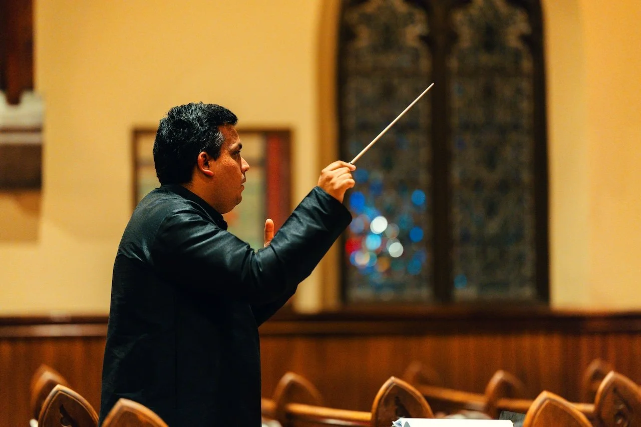 Here is Benjamin conducting the SVU Chamber Singers in their Fall 2025 concert 'Earth to Heaven' in the beautiful setting of Grace Episcopal Church, Lexington Virginia.
