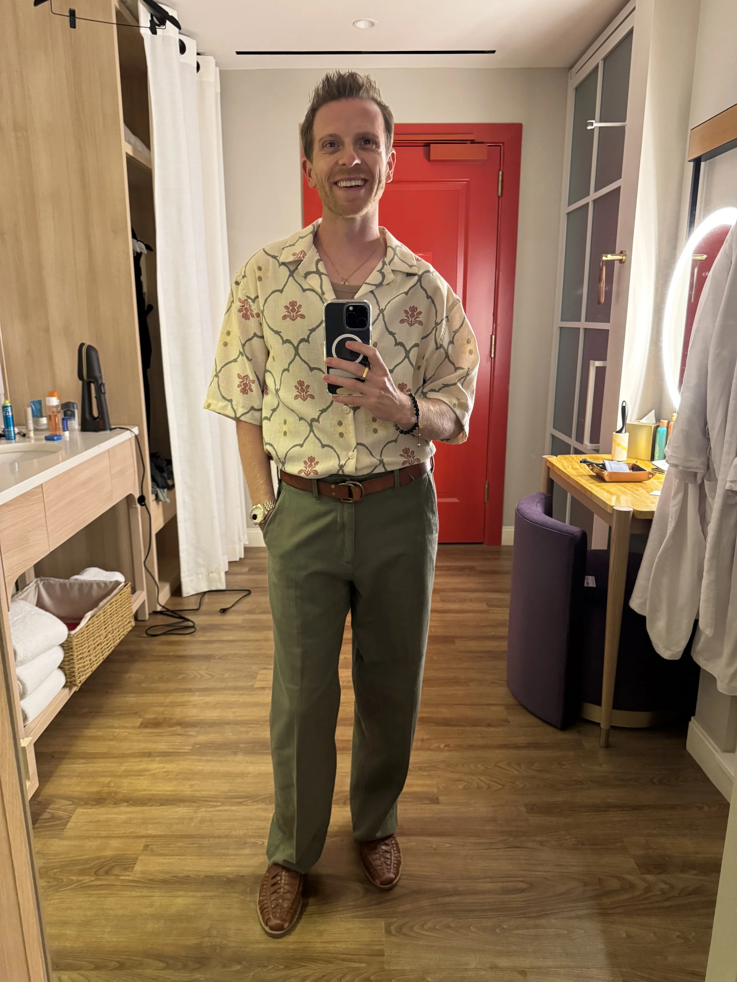 Real conference outfit with patterned camp shirt and green trousers