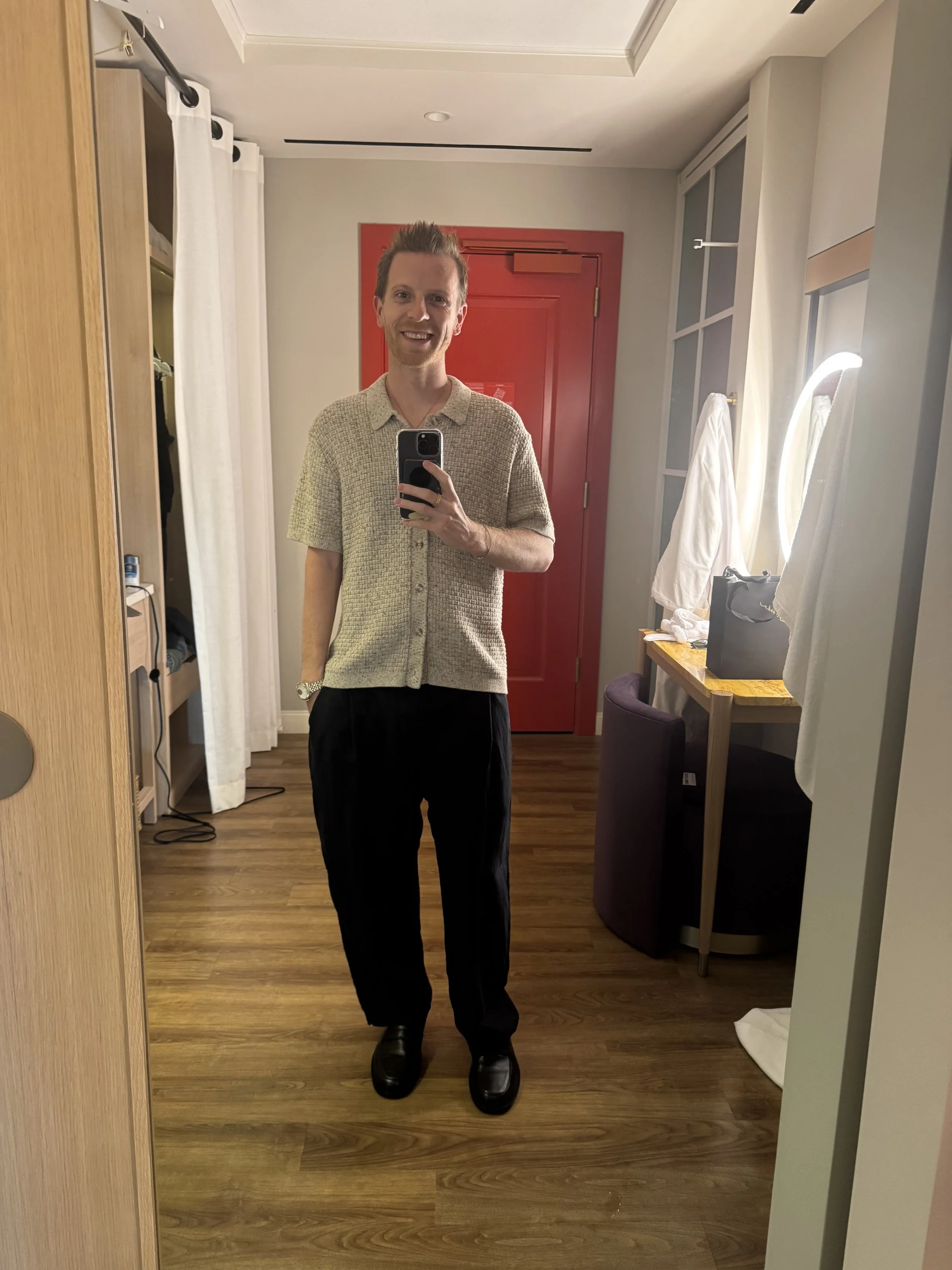 Real conference outfit with textured knit polo and black trousers