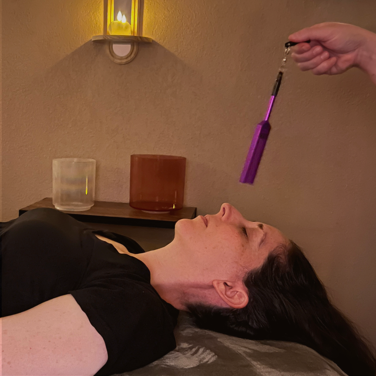 Therapeutic tuning fork used during a nervous system balancing session.