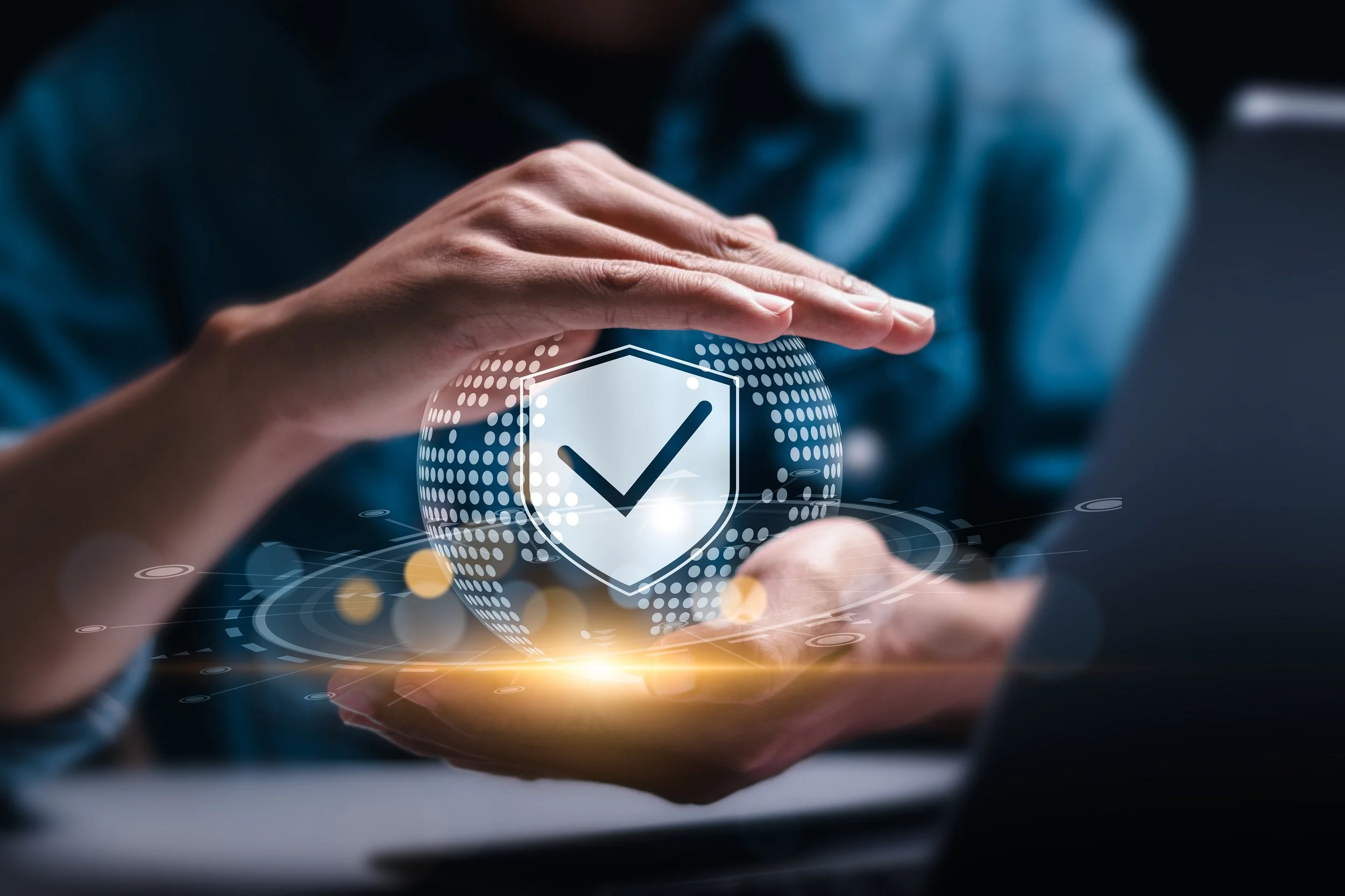 Businessman with virtual cyber security technology and online data protection