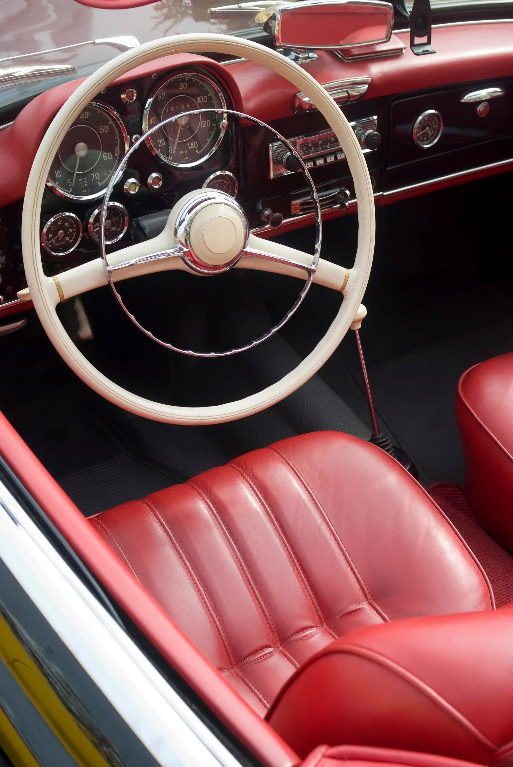 Red leather interior of an old cabriolet