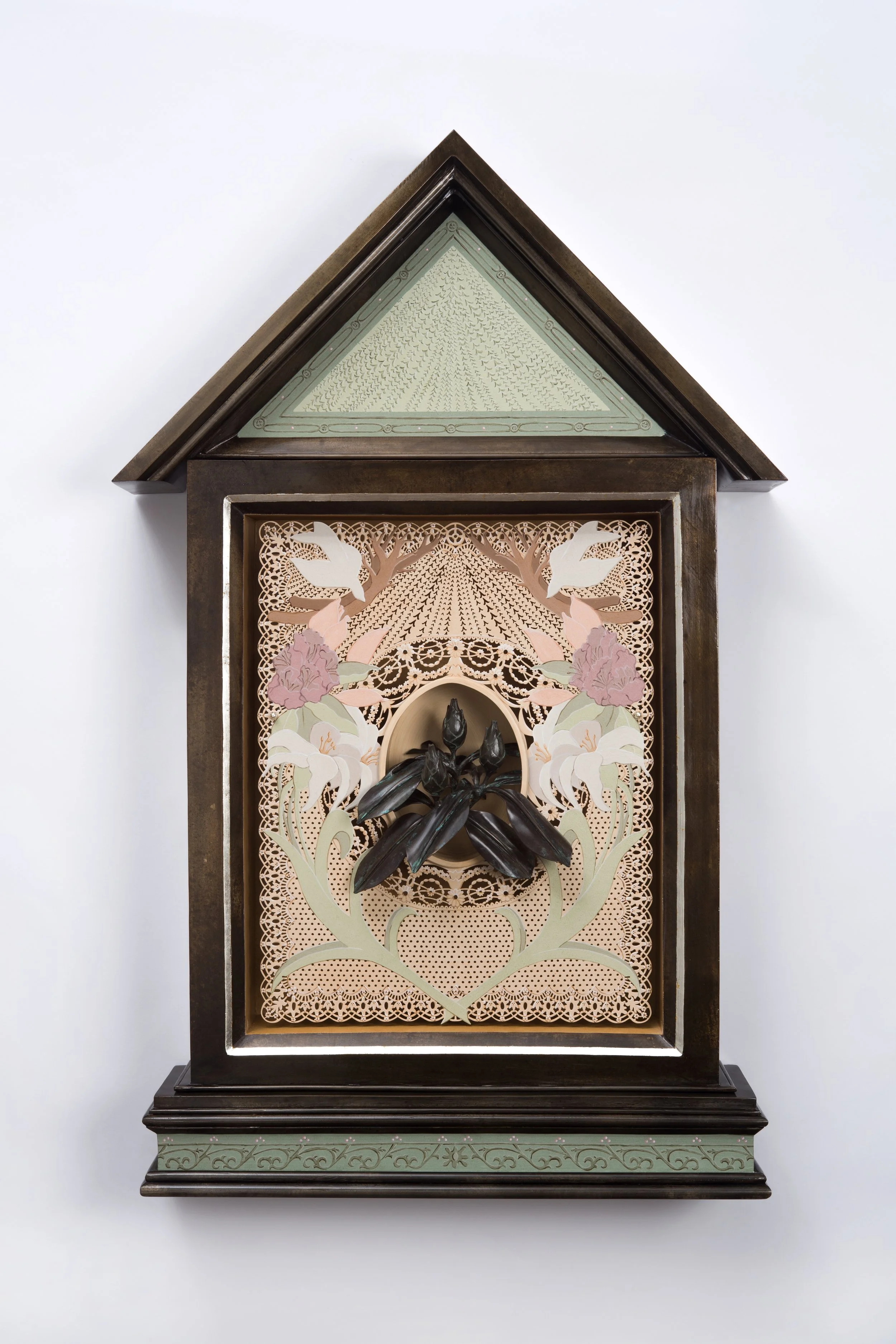 Flora and fauna reveal weeping willow branches in a celebration of Nature. The bronze rhododendron is centrally placed and framed by a realistic but monumental lace holy card.