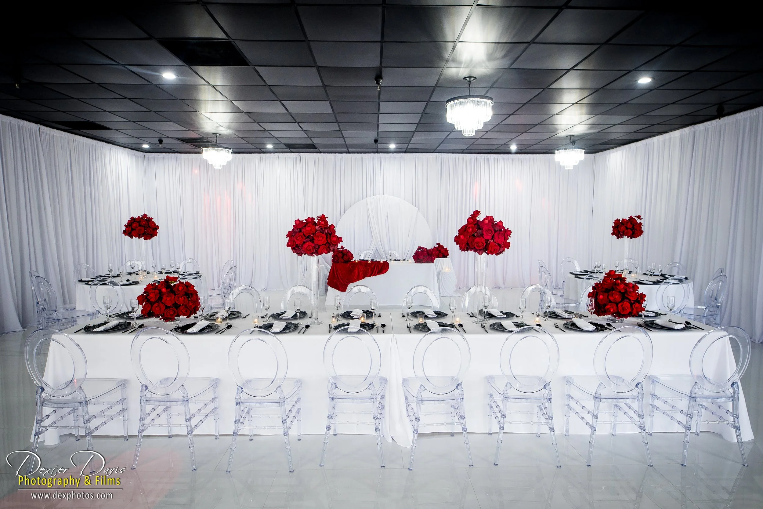   Stunning red and white rose setup at The Valentine — a dreamy and budget-friendly Orlando wedding venue.  