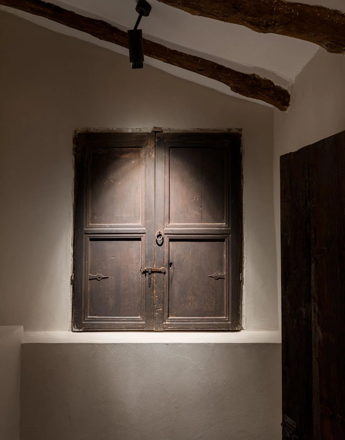 Restored seventeenth century wooden interior shutters in Altea residence by Atelier Valencia