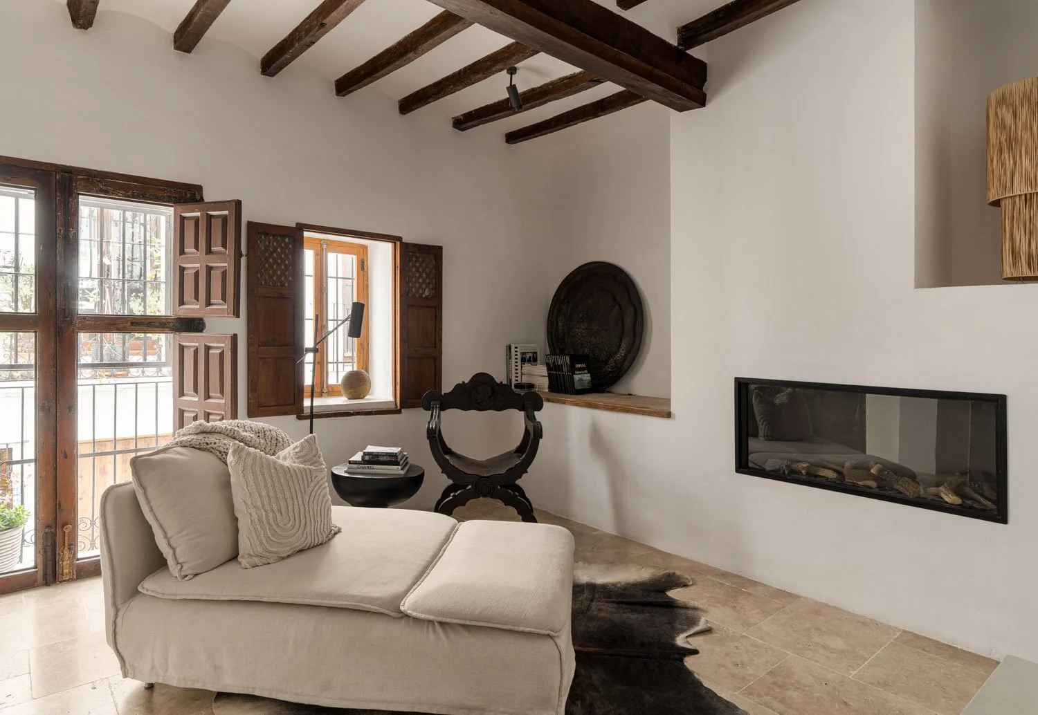 Living room with antique wooden shutters
