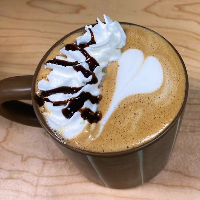 YinYang Specialty Mocha topped with whipped cream made by our amazing Lead Barista, @madsgibson0 Mads is wonderful and can help you pick out the perfect drink! 

#coffecafe #coffeeshopvibes #healthier #loveislove #loveyourself