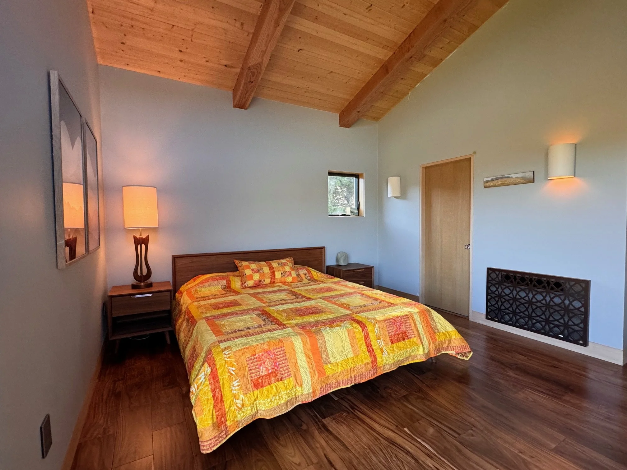 Yellow Bedroom-- rove furniture, king tempur-pedic mattress, quilt designed by owner and created by her parents