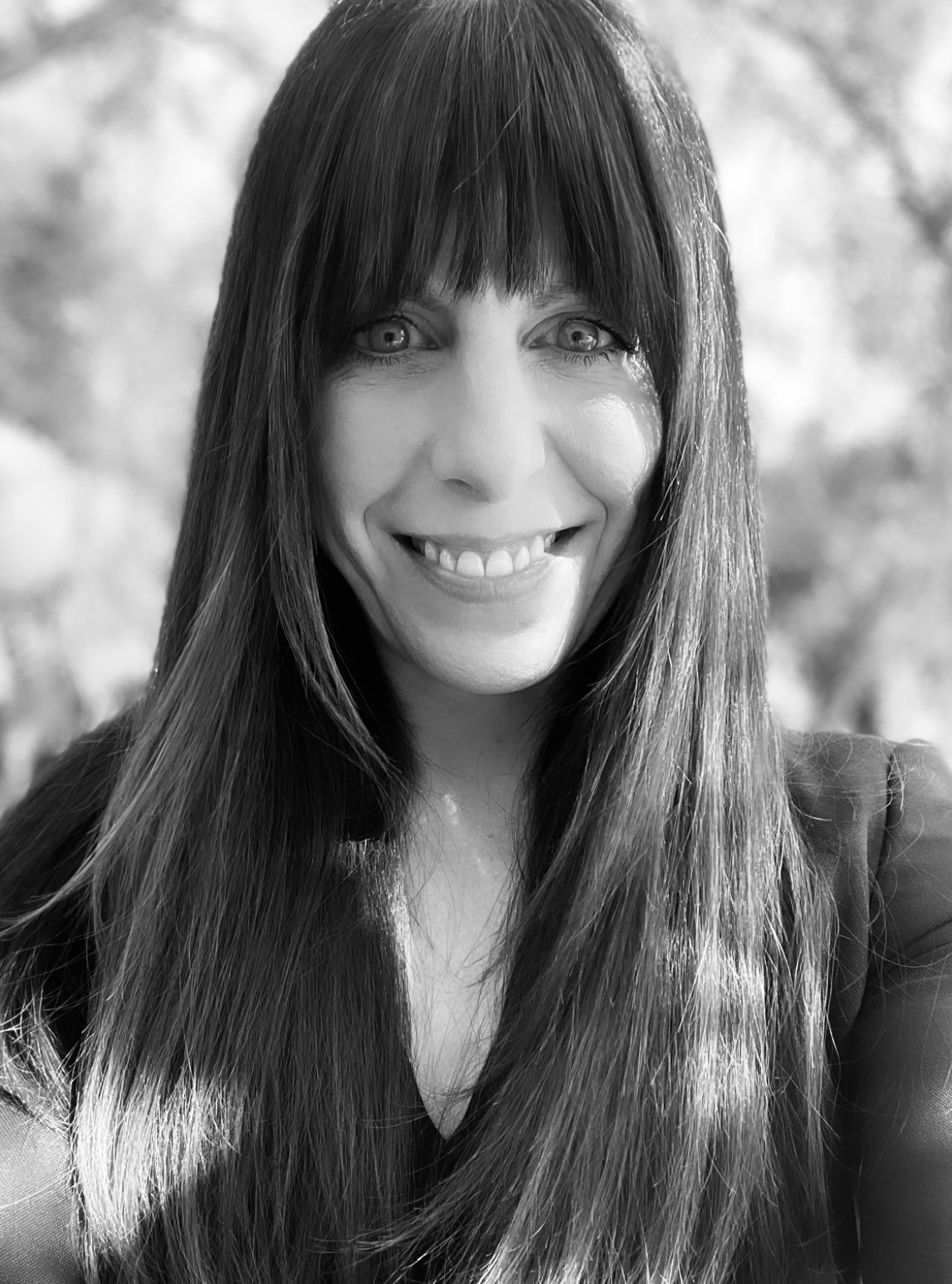 Black & white portrait of Dani Audette, founder of Audette Law