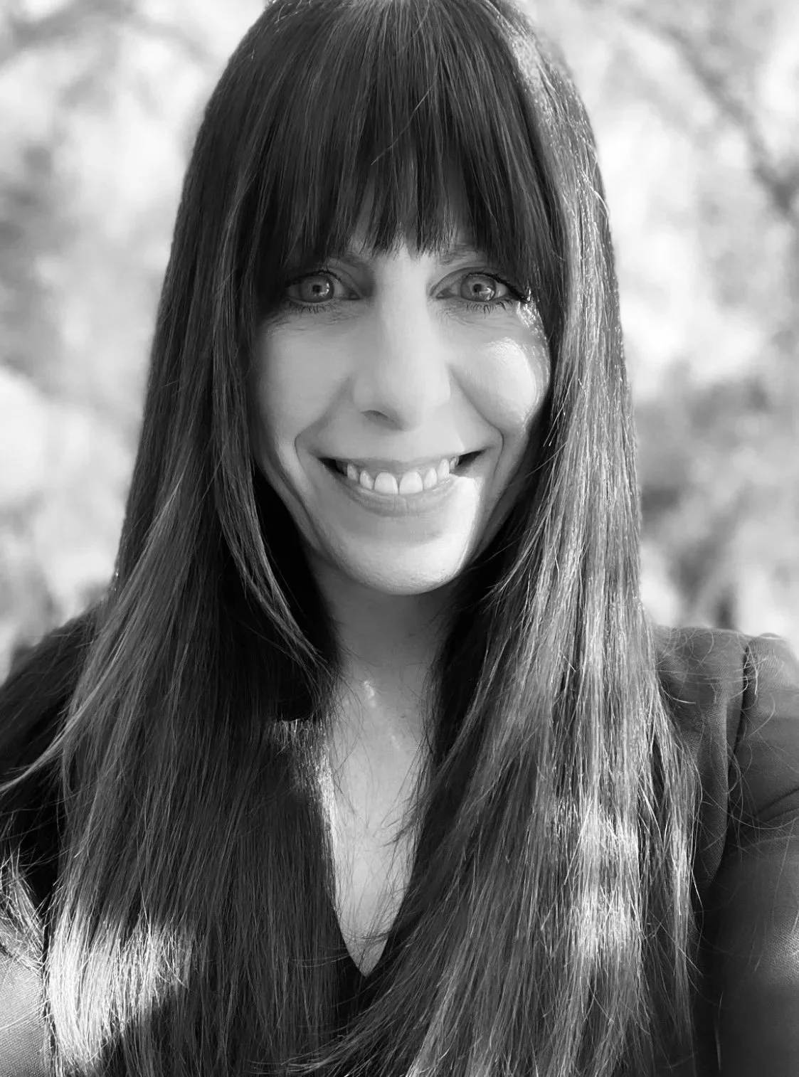 Black and white photograph of Dani Audette, founder of Audette Law