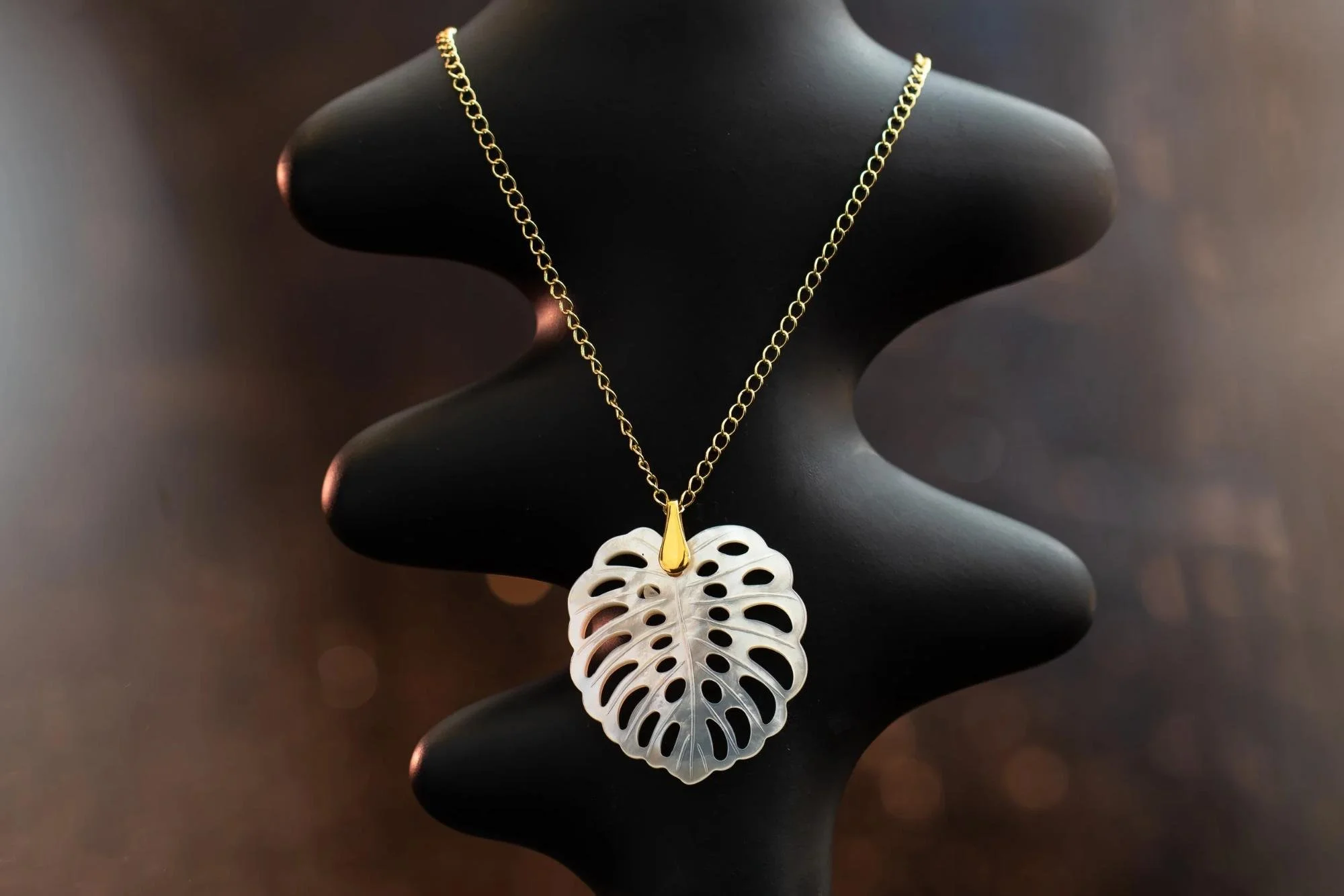 white_monstera_leaf_pendant_web.jpg