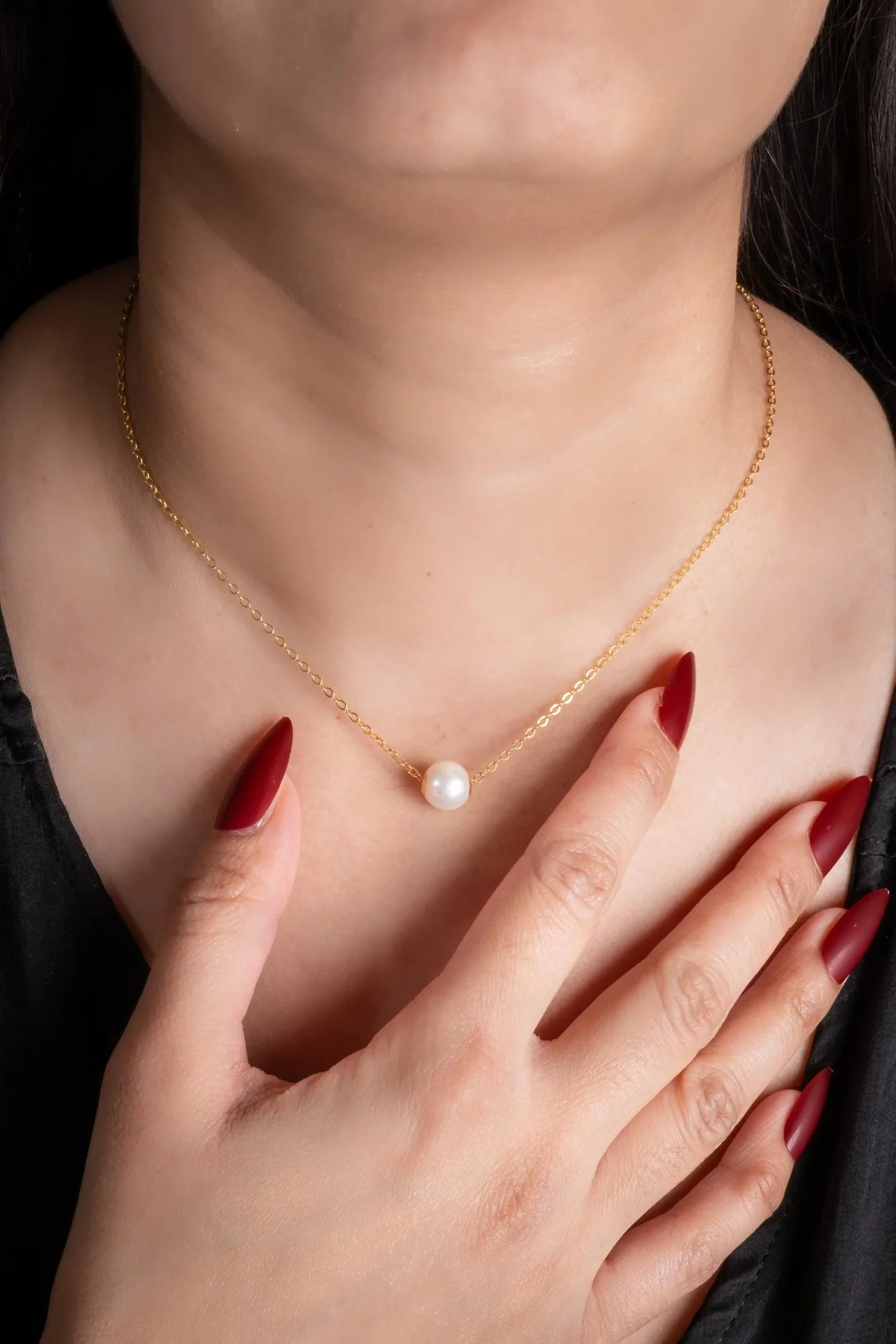 A perfect pearl -  quiet luxury distilled into a single perfect moment.