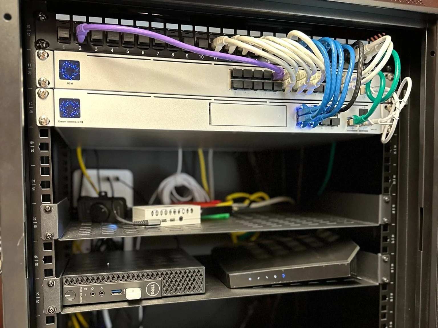 This is the main cabinet or rack.  It contains all the essentials in one confined spot with extra cooling if needed. All the wires in your home will run to this single spot. 