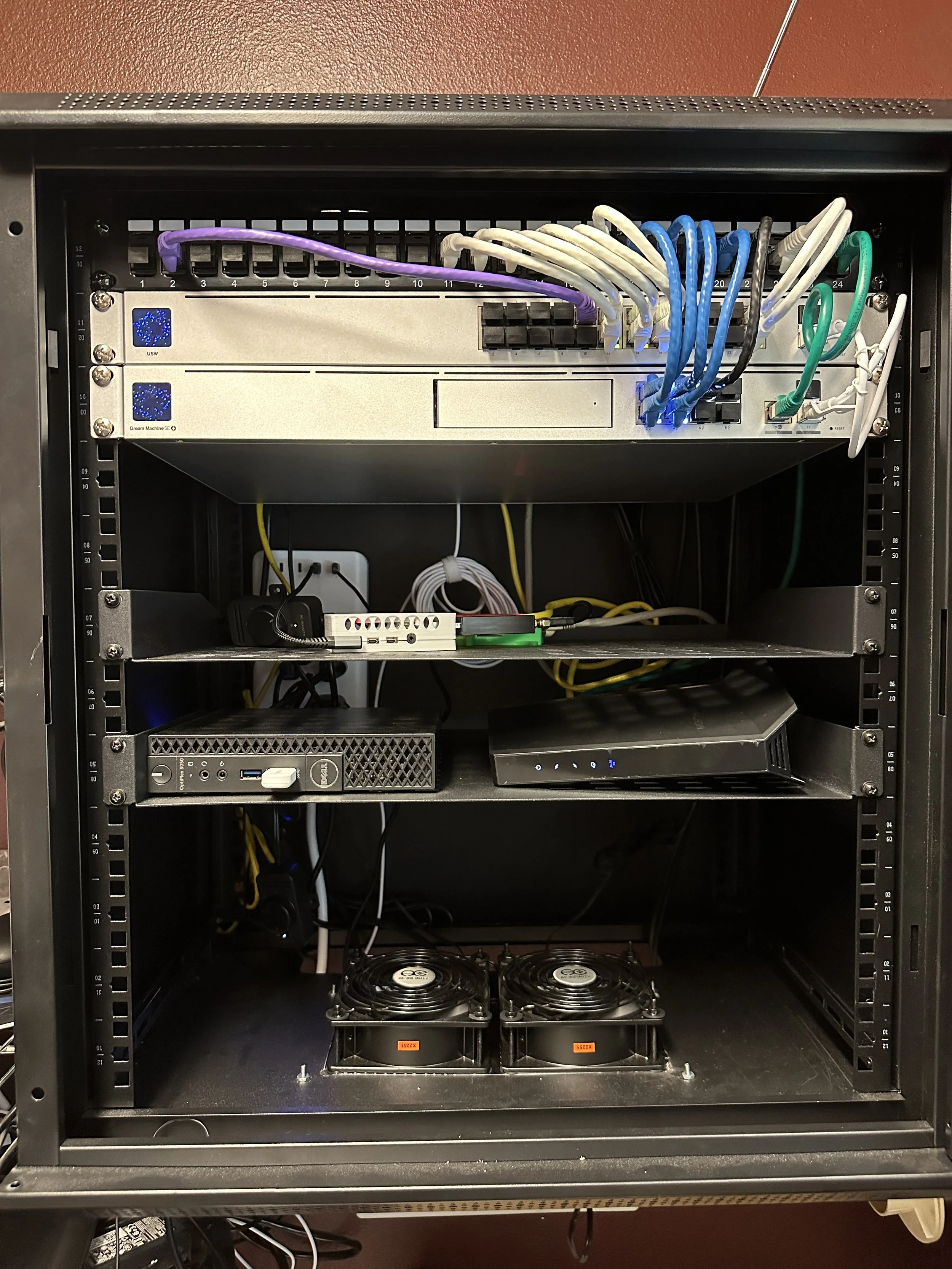 The patch panel up top brings all the cables from the house to one spot and runs them into the switch and the router handles all of the connections for the house.