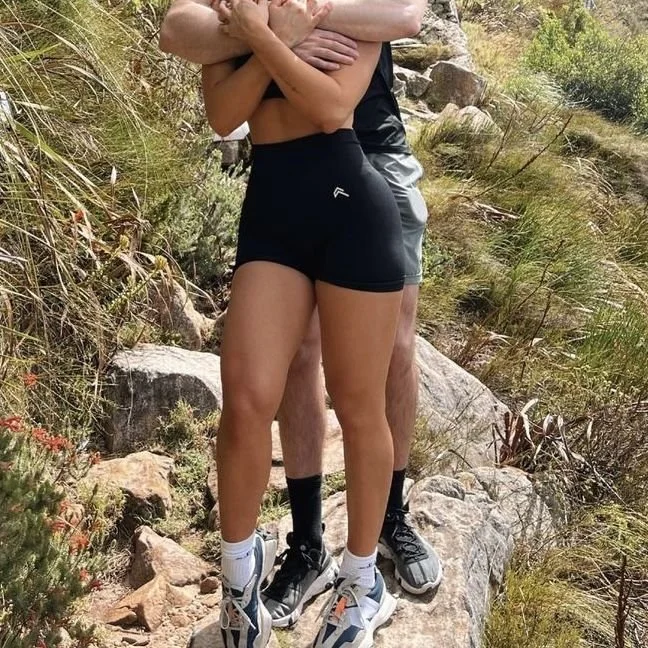 Image of woman in oner active set hiking with boyfriend in los angeles