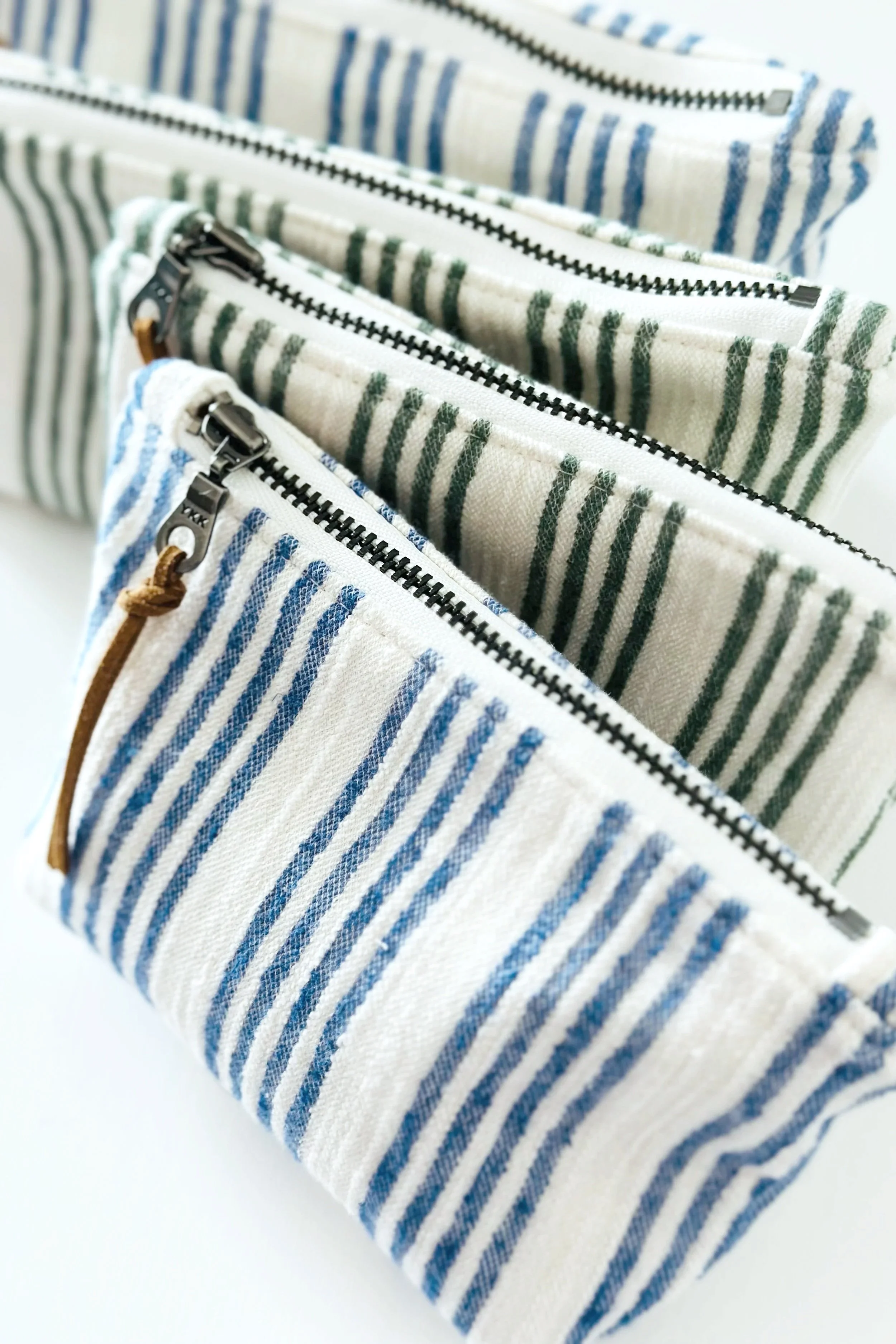  Handmade striped zipper pouch in green and blue — The Thrift Edit Summer 26 by Wood and Threads by Jen. Limited run, ships May 23. 