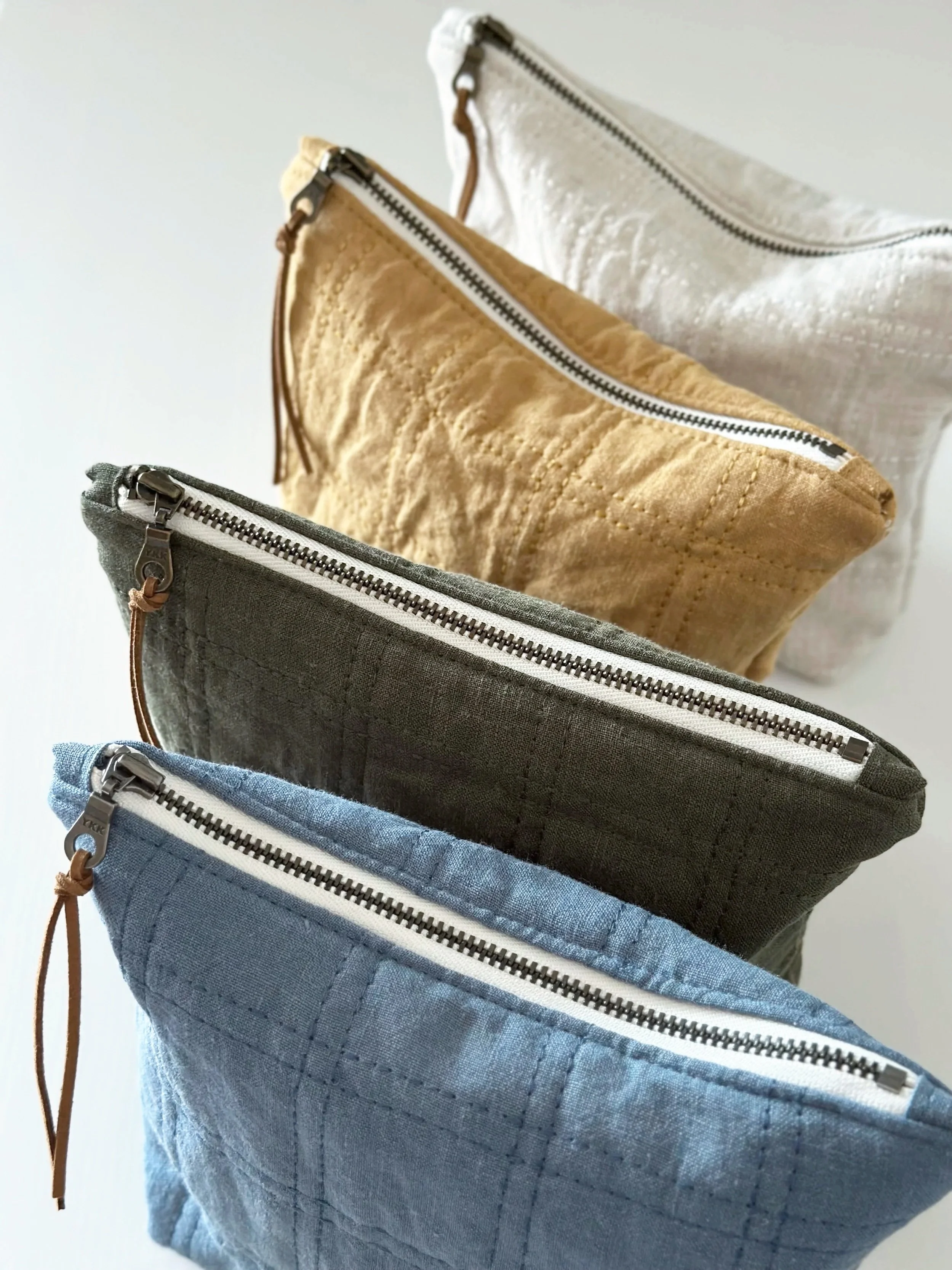 Quilted Linen Pouches Back in Stock: Oat, Olive, Dusty Blue, and Cornfield