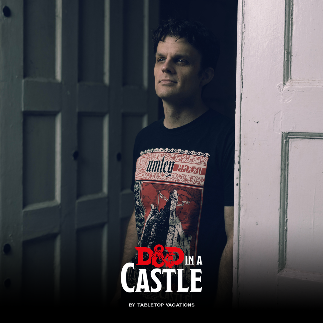 Male stood by a white door