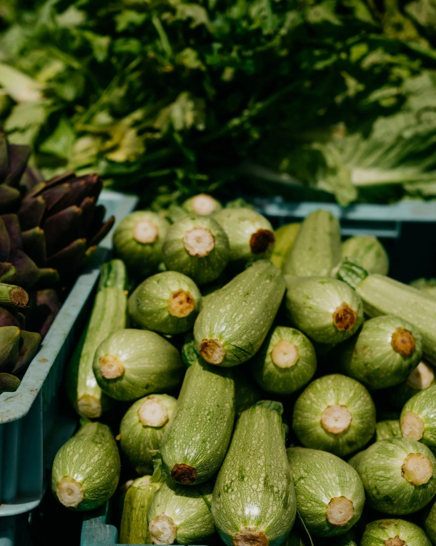 The Carcassonne market on a Saturday morning. Peaches are just coming into season, and the first courgettes are in season. 

We arrange private chefs for the week, or guests find their own way to the market and back. Either way, lunch tends to last w