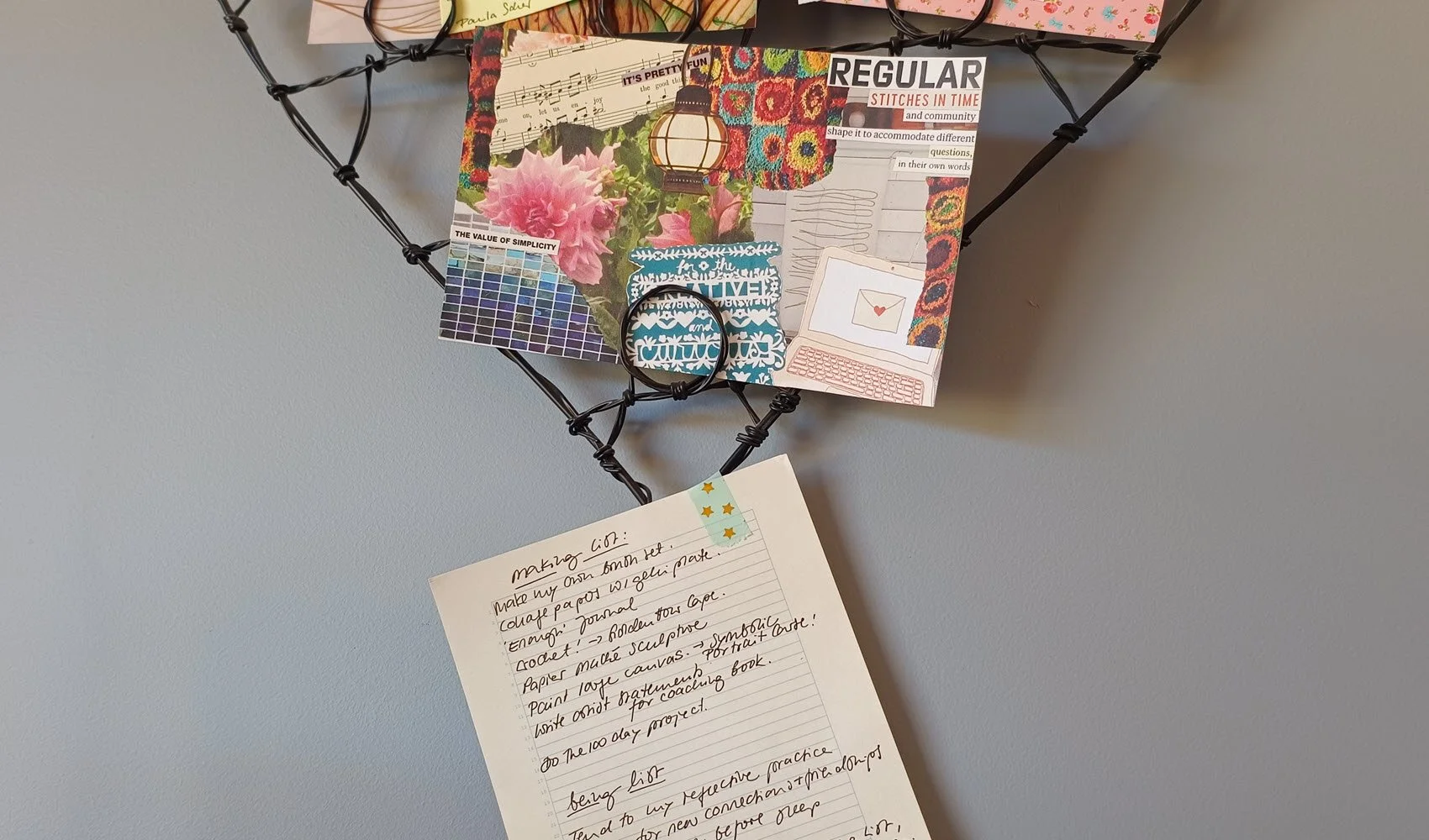 A handwritten list titles 'making list' that is stuck to a metal pinboard