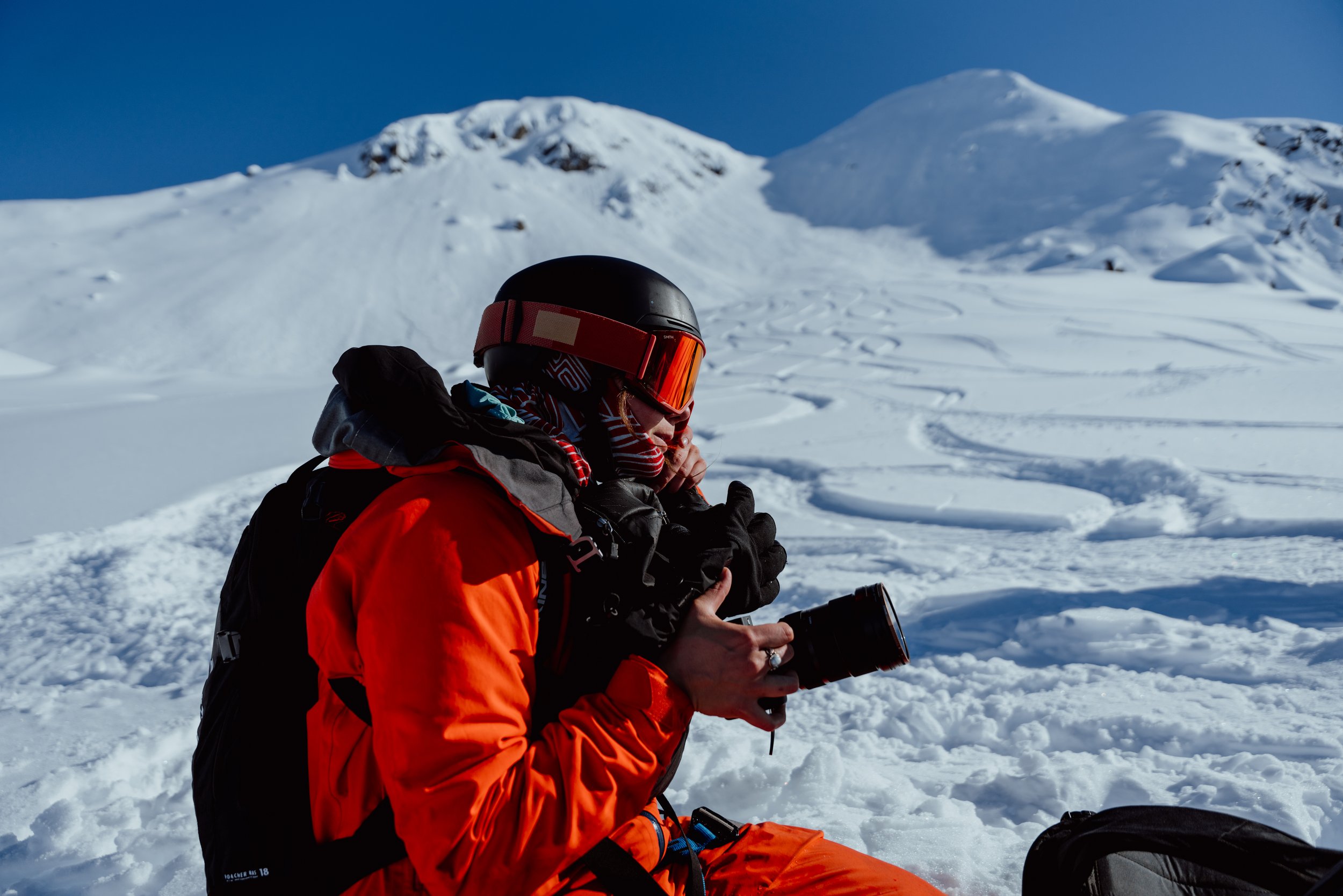 Maddy Reynolds on site in the Alaskan backcountry filming for Heli Uncharted.