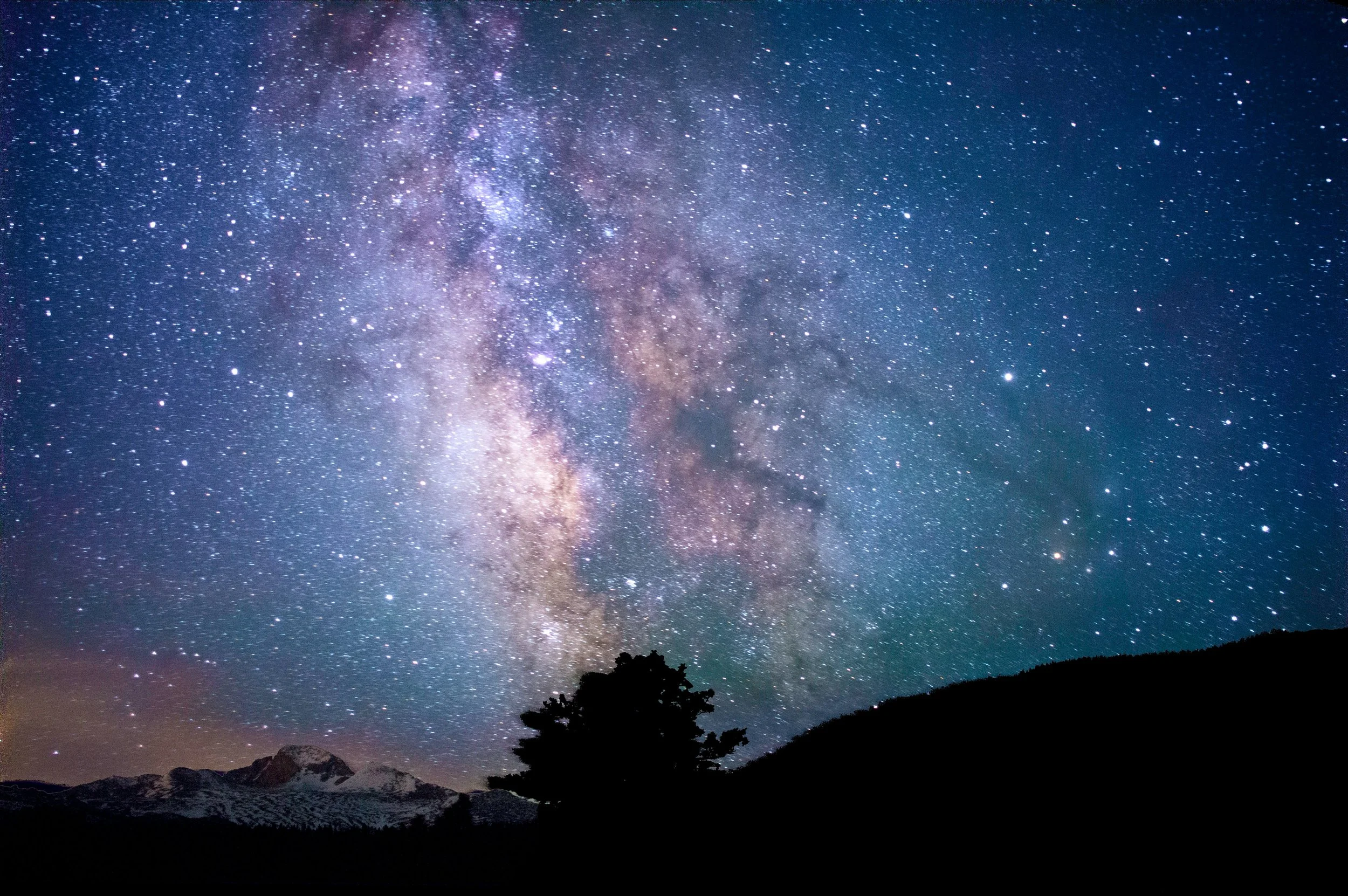 God reveals Himself through the grandeur of the Milky Way as seen from Rocky Mountain National Park.