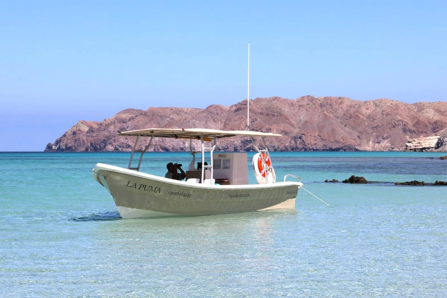 Baja Adventures boat on Carmen island during a marine adventure in the waters off Loreto, Baja California Sur.