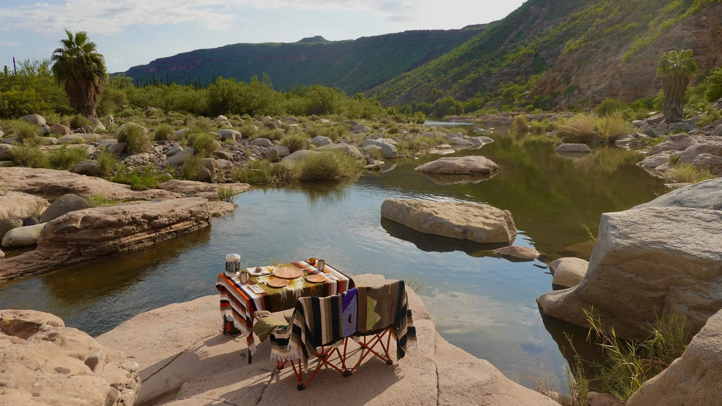 Bespoke romantic proposal experience with private dining at a secluded desert oasis near Loreto and the Sierra de la Giganta.