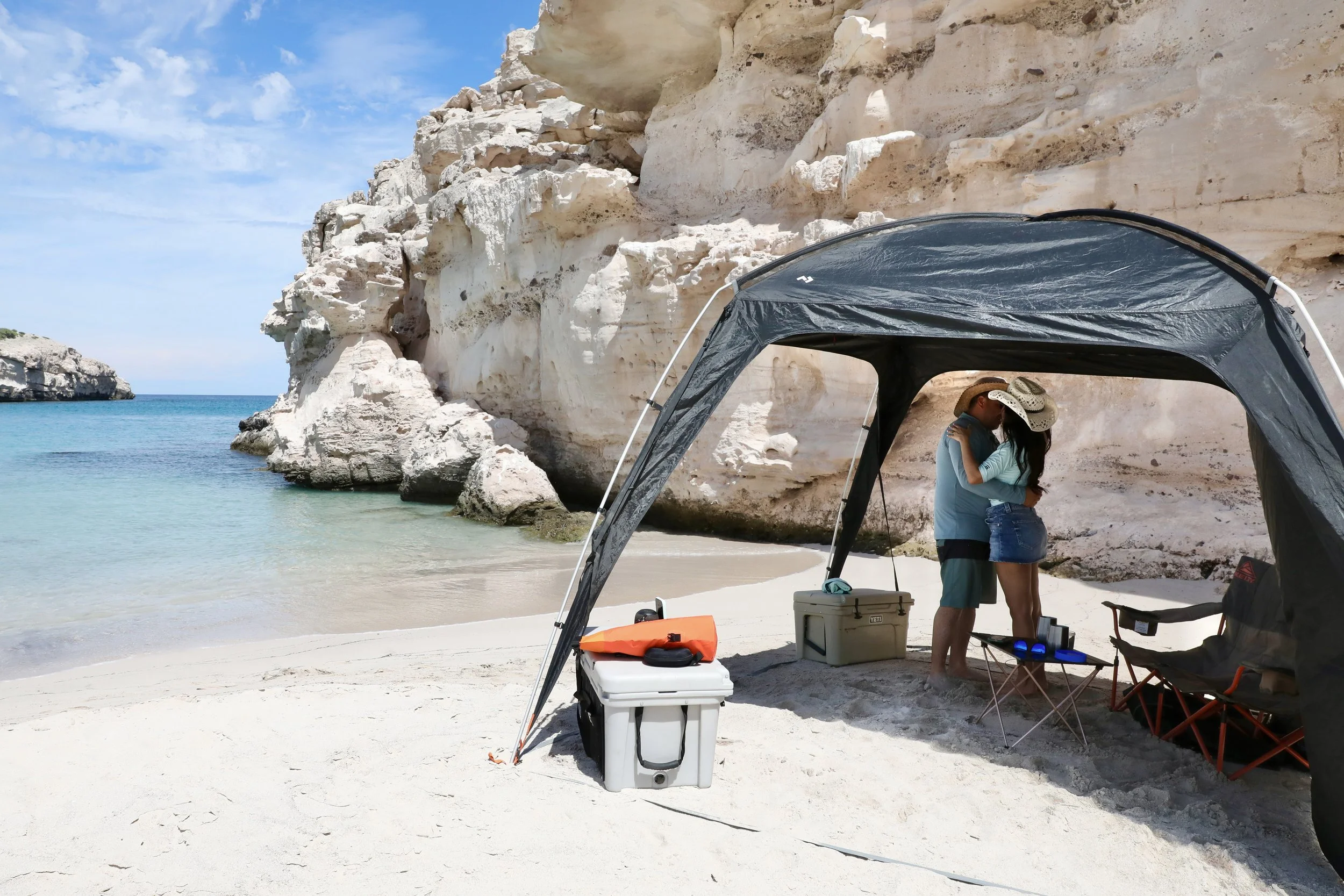 Couple enjoying an intimate engagement moment during a private nature adventure in Loreto, Baja California Sur.
