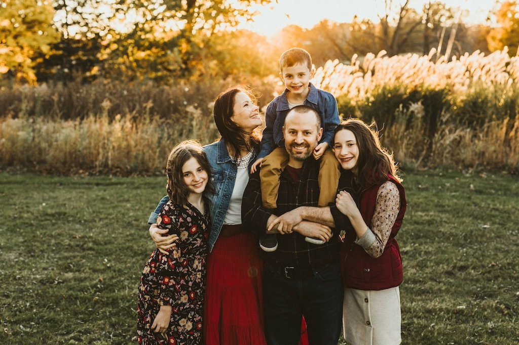 A golden hour fall shoot of a family of 5 in Acacia Reservation. 