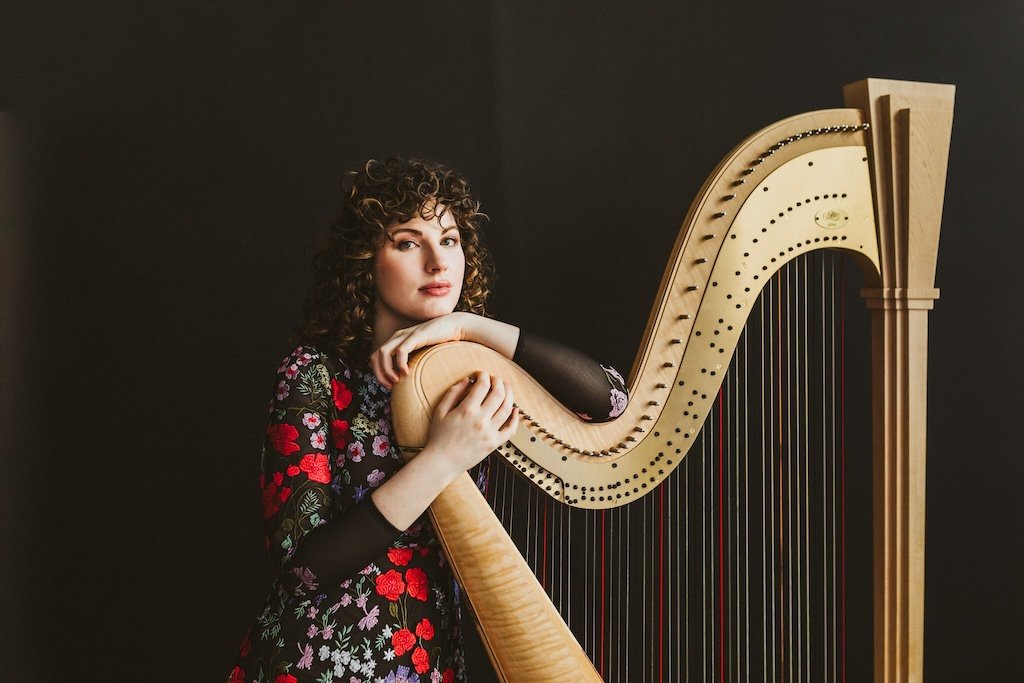 Musician branding shoot in Cleveland, Ohio studio with musical instrument. 