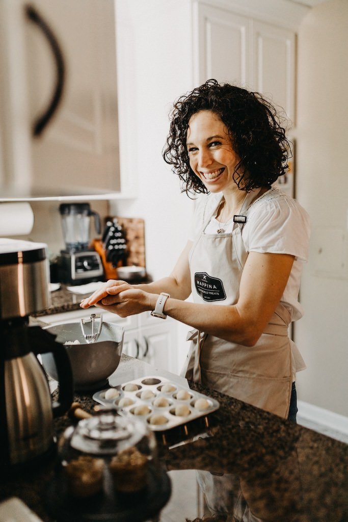 Personal branding shoot at home of woman baking at home in Cleveland, Ohio. 