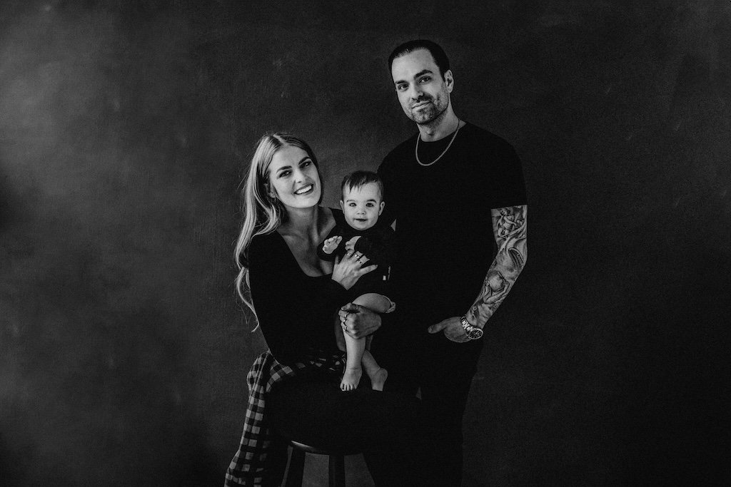 A black and white family portrait in modern style in Cleveland studio.