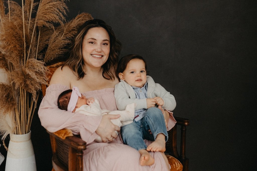 Mom and kids posing for photoshoot in Cleveland photography studio.