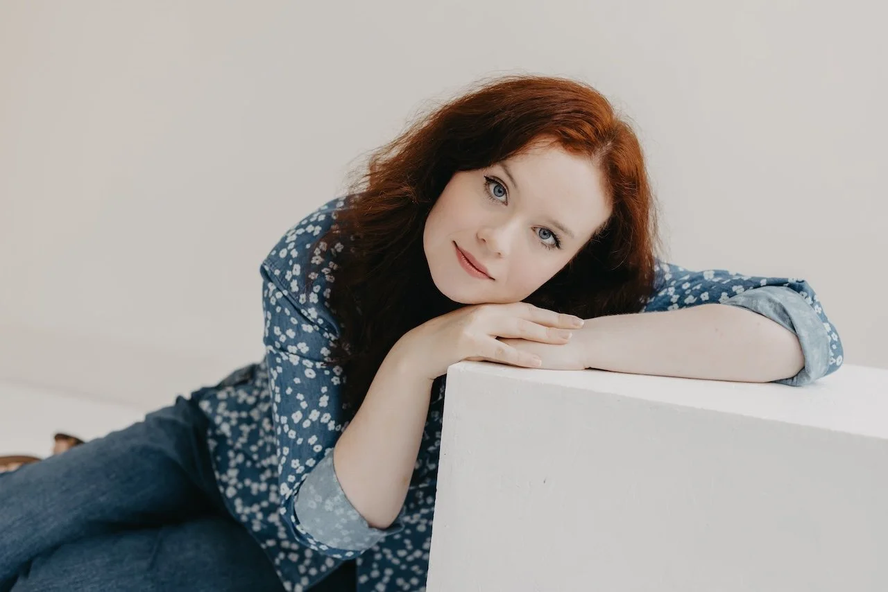Headshot of woman wearing denim in Cleveland photo studio